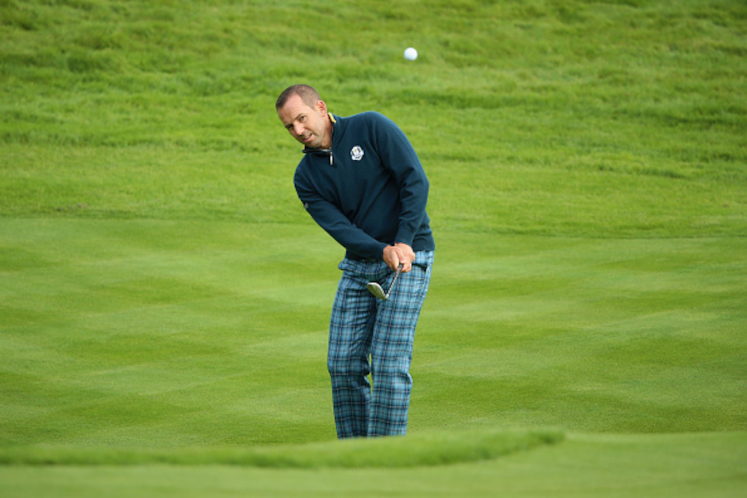 AUCHTERARDER, SCOTLAND - SEPTEMBER 23: Sergio Garcia of Europe chips during practice ahead of the 2014 Ryder Cup on the PGA Centenary course at the Gleneagles Hotel on September 23, 2014 in Auchterarder, Scotland.  (Photo by Andrew Redington/Getty Images)