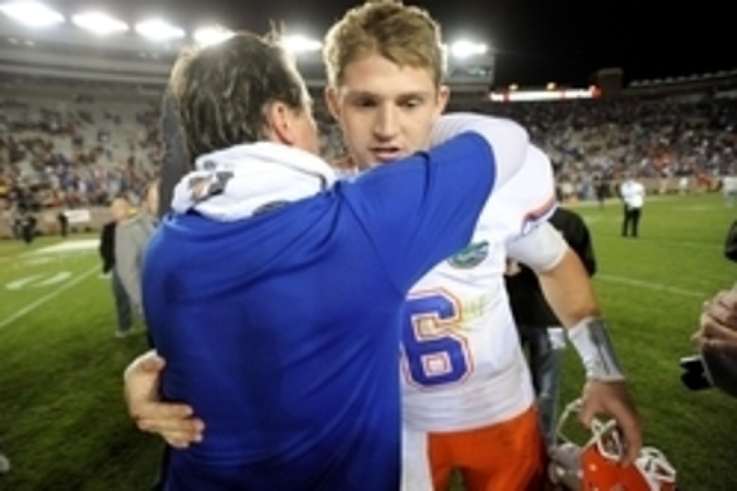 Nov 24, 2012; Tallahassee, FL, USA; Florida Gators quarterback Jeff Driskel (6) hugs head coach Will Muschamp following a victory over Florida State Seminoles at Doak Campbell Stadium. Mandatory Credit: Kevin Liles-USA TODAY Sports