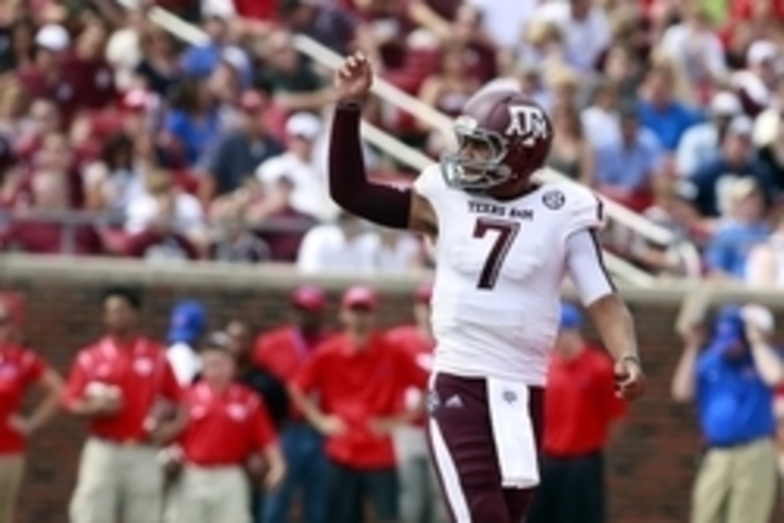 Sep 20, 2014; Dallas, TX, USA; Texas A&M Aggies quarterback Kenny Hill (7) celebrates a touchdown in the game against the Southern Methodist Mustangs at Gerald J. Ford Stadium. Texas A&M beat Southern Methodist 58-6. Mandatory Credit: Tim Heitman-USA TODA