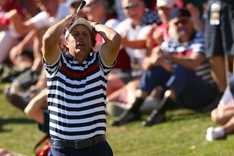 MEDINAH, IL - SEPTEMBER 30:  Phil Mickelson of the USA reacts to a shot on the 17th hole during the Singles Matches for The 39th Ryder Cup at Medinah Country Club on September 30, 2012 in Medinah, Illinois.  (Photo by Mike Ehrmann/Getty Images)