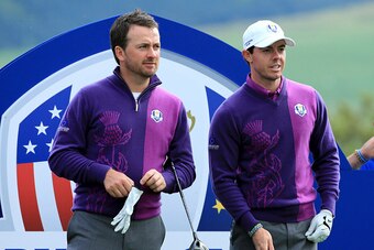 AUCHTERARDER, SCOTLAND - SEPTEMBER 24:  Rory McIlroy (R) and Graeme McDowell of Europe look on during practice ahead of the 2014 Ryder Cup on the PGA Centenary course at the Gleneagles Hotel on September 24, 2014 in Auchterarder, Scotland.  (Photo by Davi