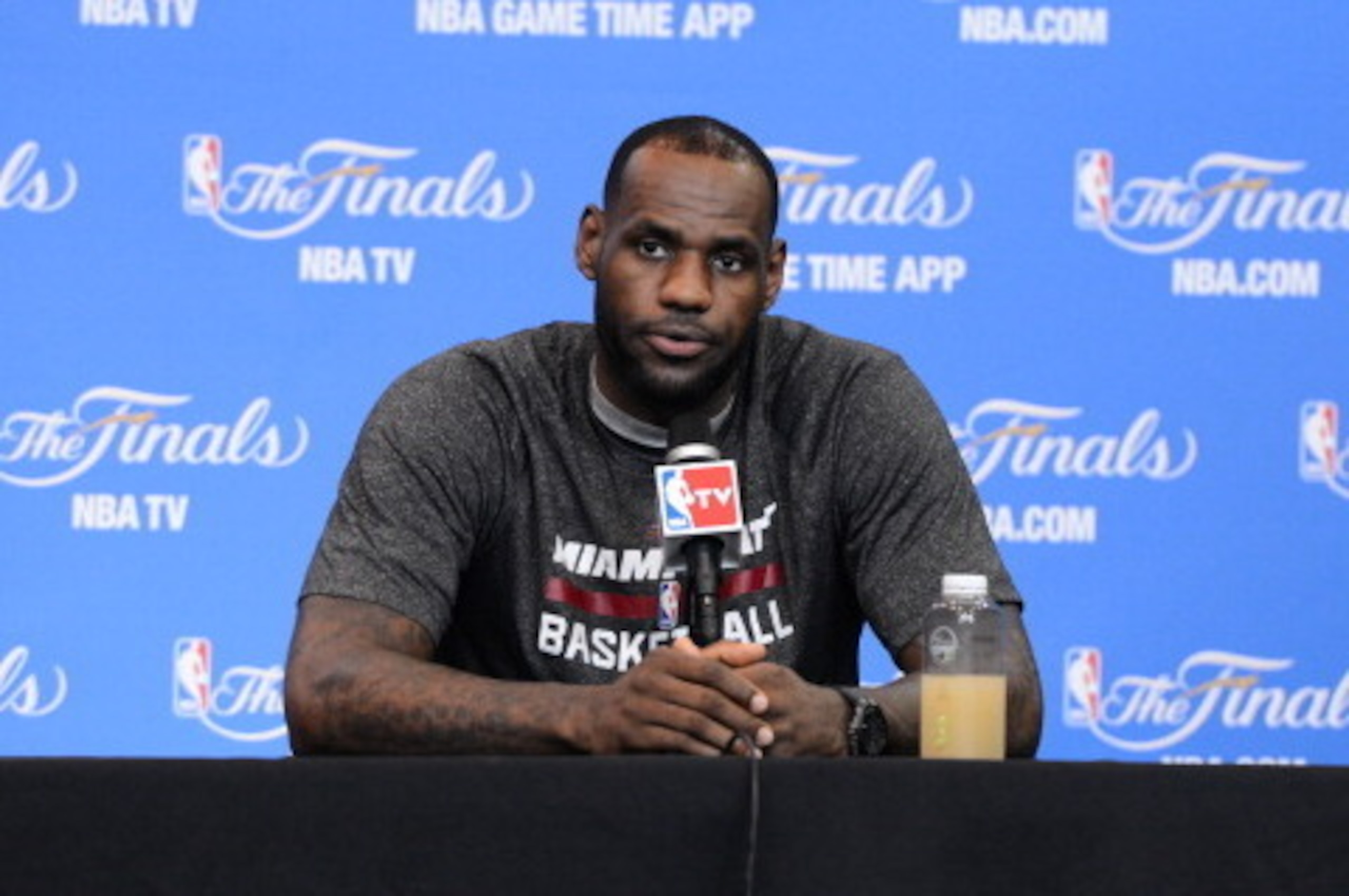 SAN ANTONIO, TX - JUNE 14: LeBron James #6 of the Miami Heat speaks to the media during practice and media availability as part of the 2014 NBA Finals on June 14, 2014 at the Spurs Practice Facility in San Antonio, Texas. NOTE TO USER: User expressly ackn SAN ANTONIO, TX - JUNE 14: LeBron James #6 of the Miami Heat speaks to the media during practice and media availability as part of the 2014 NBA Finals on June 14, 2014 at the Spurs Practice Facility in San Antonio, Texas. NOTE TO USER: User expressly ackn