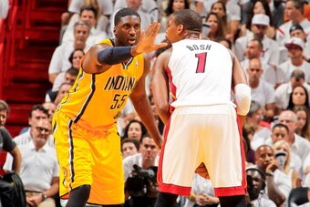 MIAMI, FL - JUNE 3: Roy Hibbert #55 of the Indiana Pacers plays defense against Chris Bosh #1 of the Miami Heat in Game Seven of the Eastern Conference Finals during the 2013 NBA Playoffs on June 3, 2013 at American Airlines Arena in Miami, Florida. NOTE