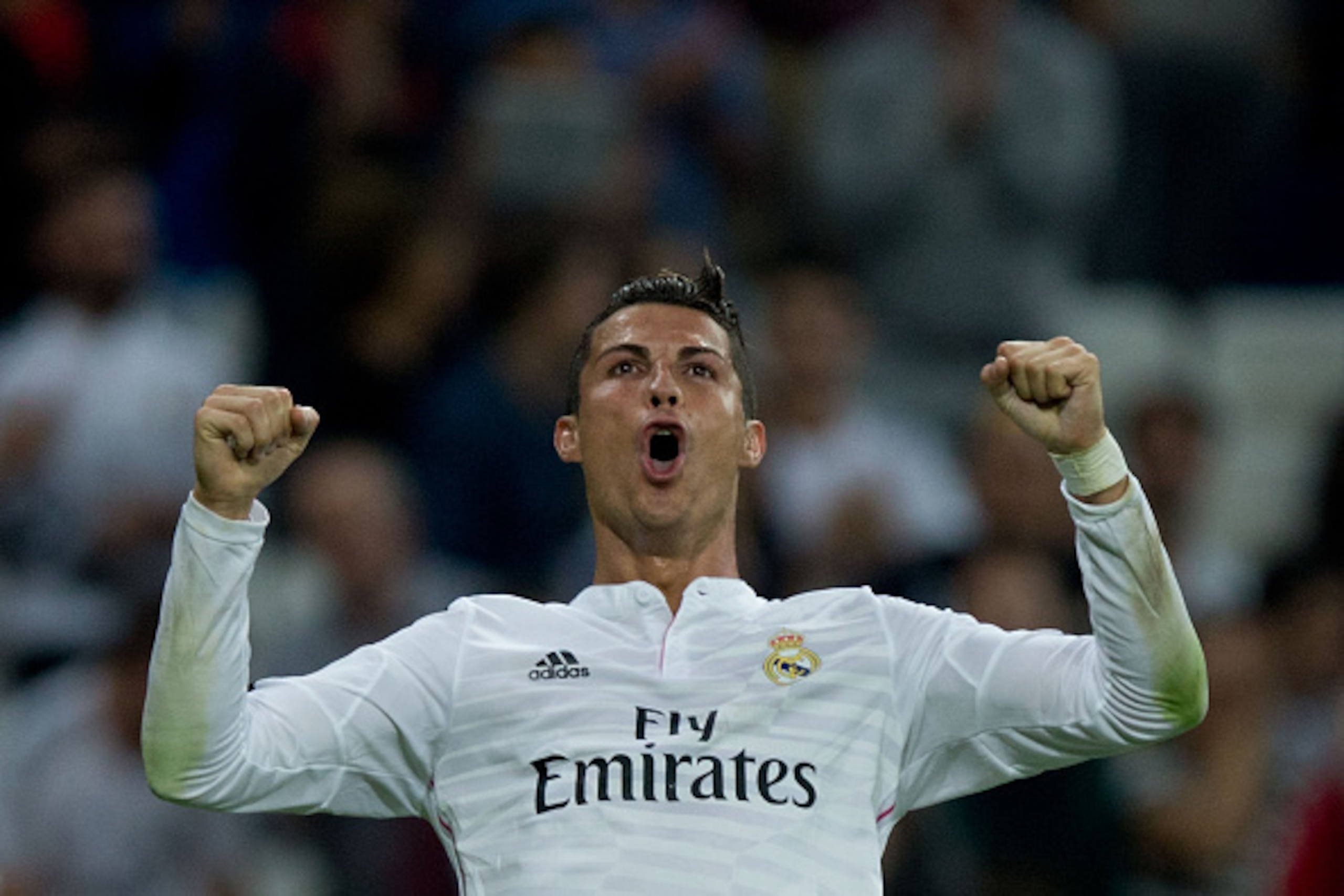 MADRID, SPAIN - SEPTEMBER 23:  Cristiano Ronaldo of Real Madrid CF celebrates scoring their fifth goal during the La Liga match between Real Madrid CF and Elche CF at Estadio Santiago Bernabeu on September 23, 2014 in Madrid, Spain.  (Photo by Gonzalo Arr