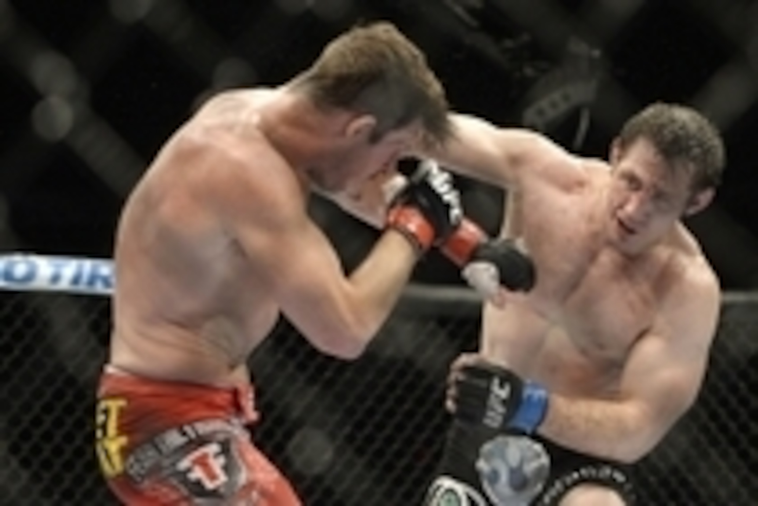 Apr 16, 2014; Quebec City, Quebec, Canada; Michael Bisping (red gloves) fights against Tim Kennedy (blue gloves) during their middleweight bout at Colisee Pepsi. Mandatory Credit: Eric Bolte-USA TODAY Sports Apr 16, 2014; Quebec City, Quebec, Canada; Michael Bisping (red gloves) fights against Tim Kennedy (blue gloves) during their middleweight bout at Colisee Pepsi. Mandatory Credit: Eric Bolte-USA TODAY Sports
