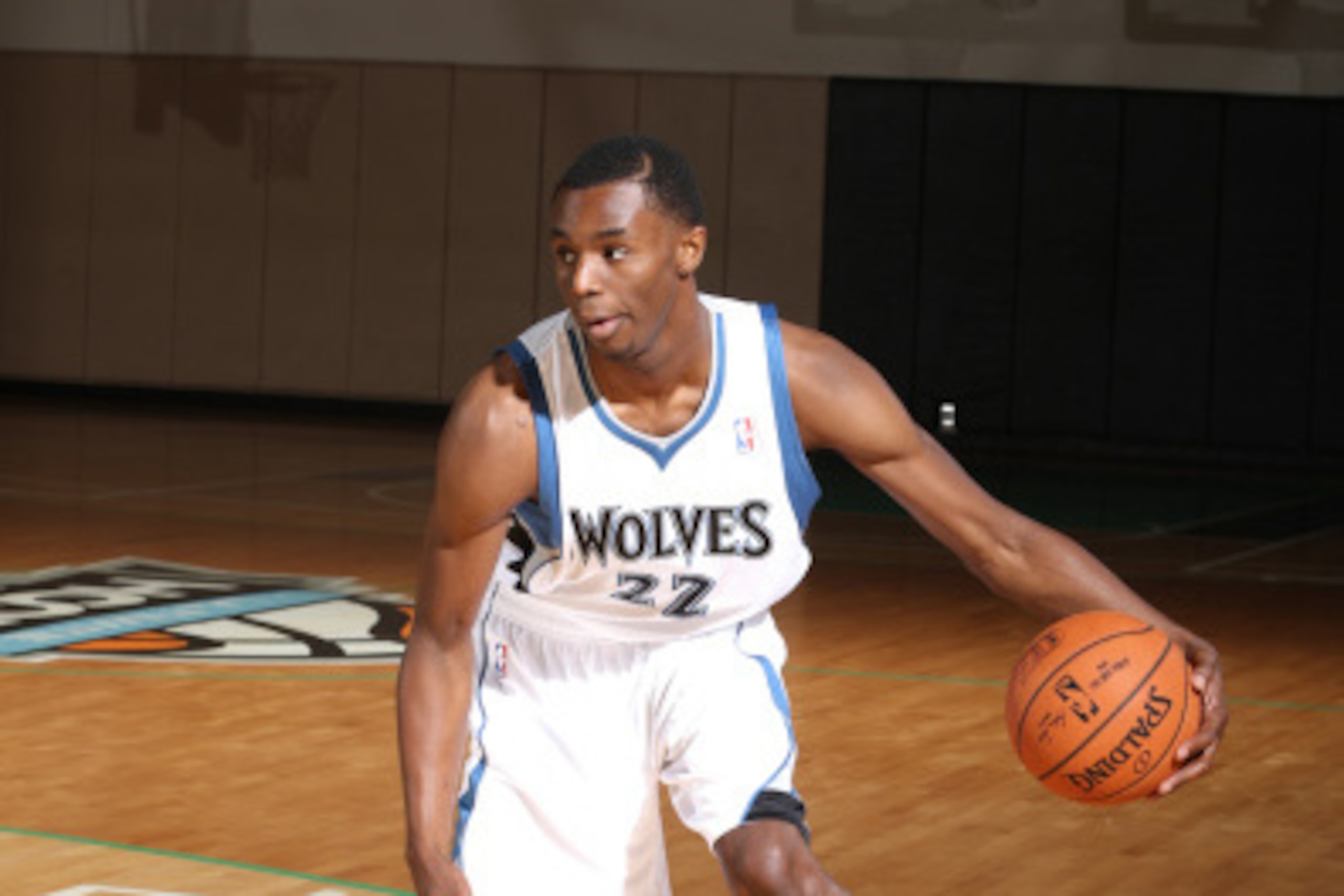 MINNEAPOLIS, MN - AUGUST 26:  Andrew Wiggins #22 of the Minnesota Timberwolves handles the ball on August 26, 2014 at Target Center in Minneapolis, Minnesota.  NOTE TO USER: User expressly acknowledges and agrees that, by downloading and or using this Pho