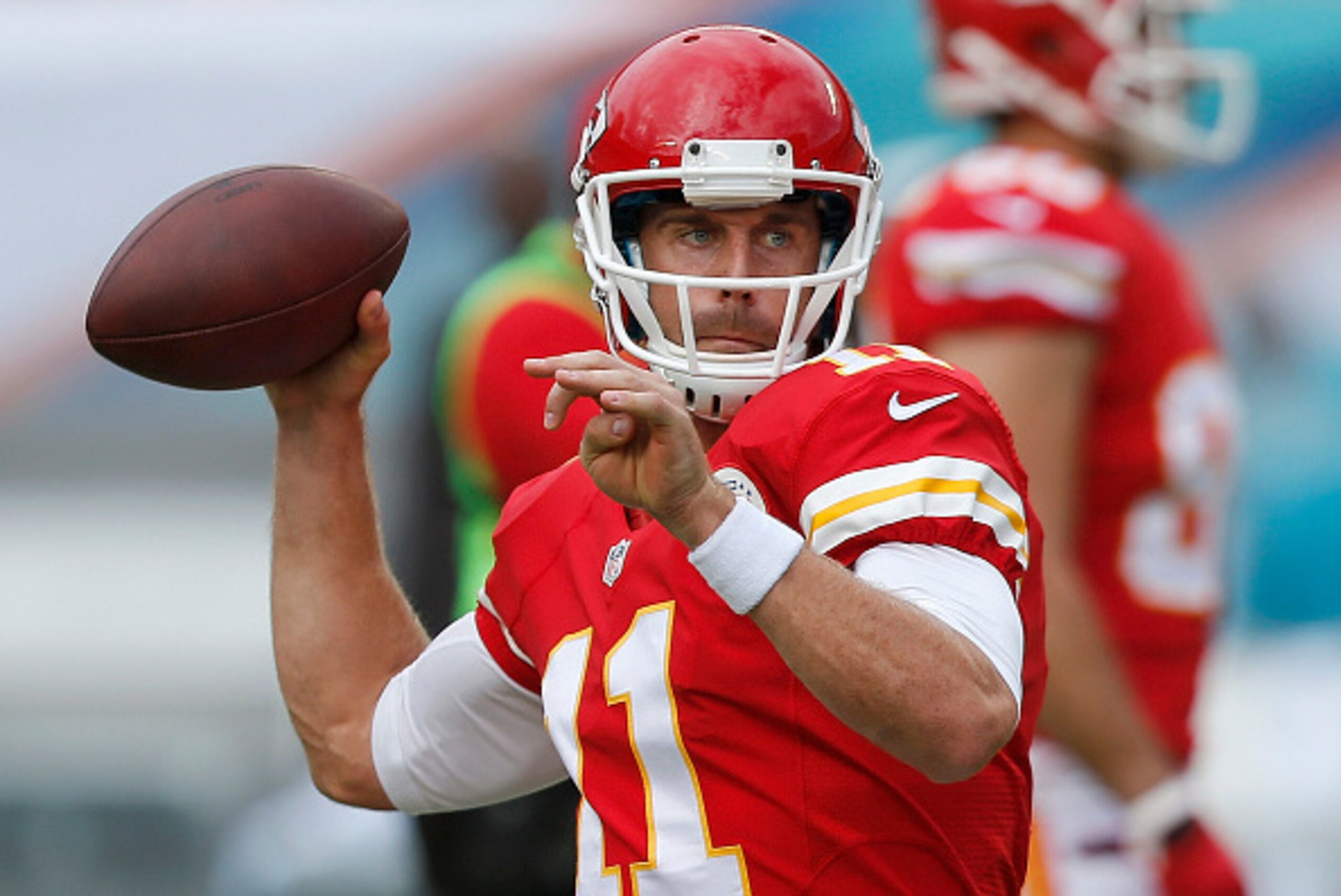MIAMI GARDENS, FL - SEPTEMBER 21:  Quarterback Alex Smith #11 of the Kansas City Chiefs throws during pregame warmups before the Chiefs met the Miami Dolphins at Sun Life Stadium on September 21, 2014 in Miami Gardens, Florida.  (Photo by Joel Auerbach/Ge