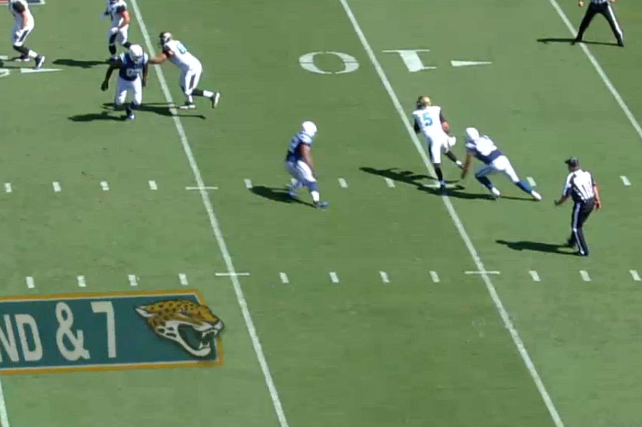 Bortles evades the defender.