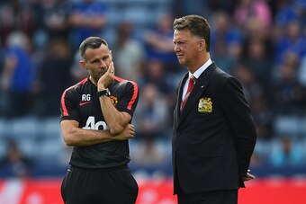 LEICESTER, ENGLAND - SEPTEMBER 21:  Ryan Giggs and Manchester United coach Louis Van Gaal in discussion prior to the the Barclays Premier League match between Leicester City and Manchester United at The King Power Stadium on September 21, 2014 in Leiceste