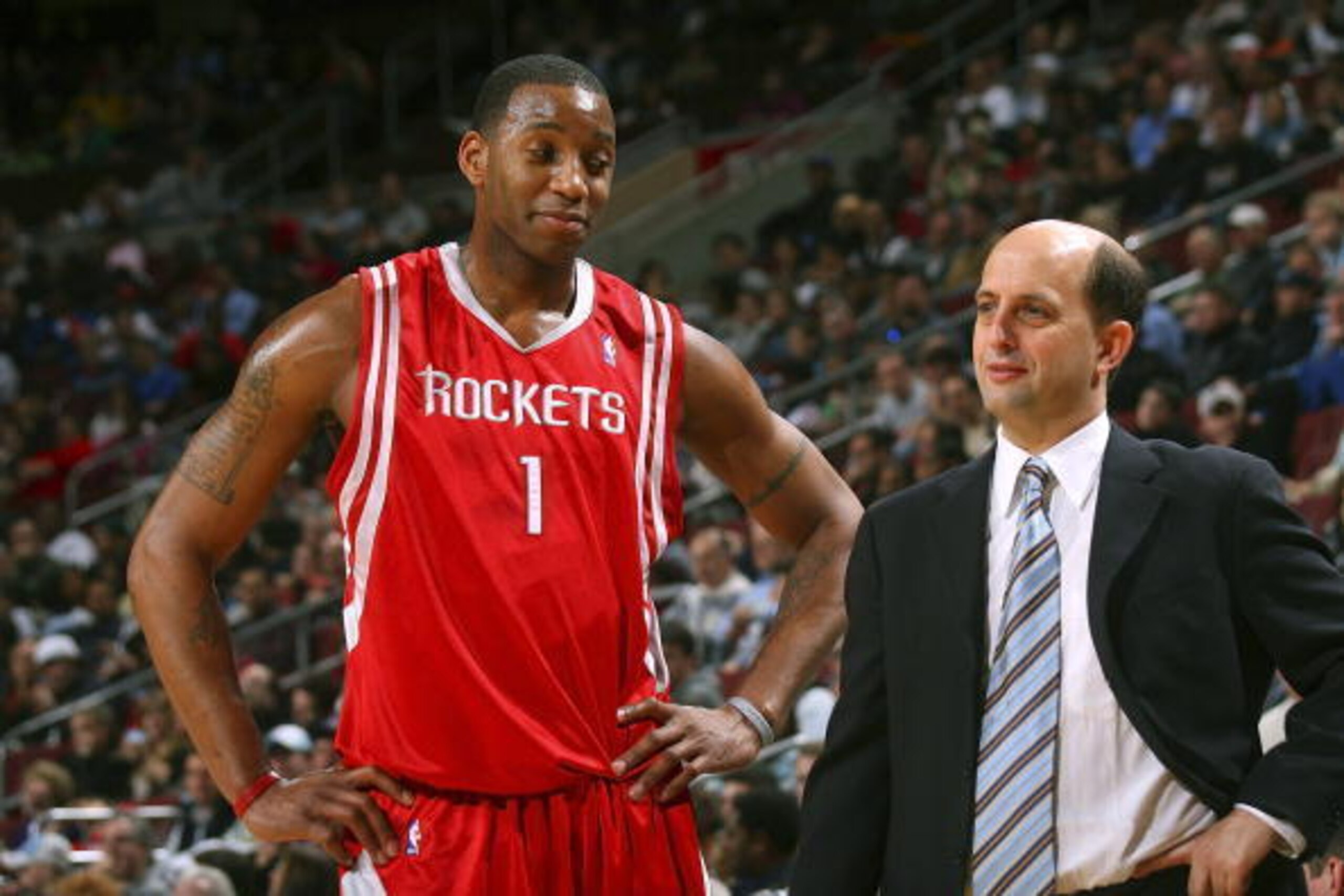 PHILADELPHIA - MARCH 18: Tracy McGrady #1 of the Houston Rockets talks with head coach, Jeff Van Gundy, during the game against the Philadelphia 76ers on March 18, 2007 at the Wachovia Center in Philadelphia, Pennsylvania. NOTE TO USER: User expressly ac PHILADELPHIA - MARCH 18: Tracy McGrady #1 of the Houston Rockets talks with head coach, Jeff Van Gundy, during the game against the Philadelphia 76ers on March 18, 2007 at the Wachovia Center in Philadelphia, Pennsylvania. NOTE TO USER: User expressly ac