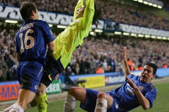 LONDON - FEBRUARY 22:  Asier Del Horno of Chelsea (R) brings down Lionel Messi of Barcelona and is sent off during the UEFA Champions League Round of 16, First Leg match between Chelsea and Barcelona at Stamford Bridge on February 22, 2006 in London, Engl