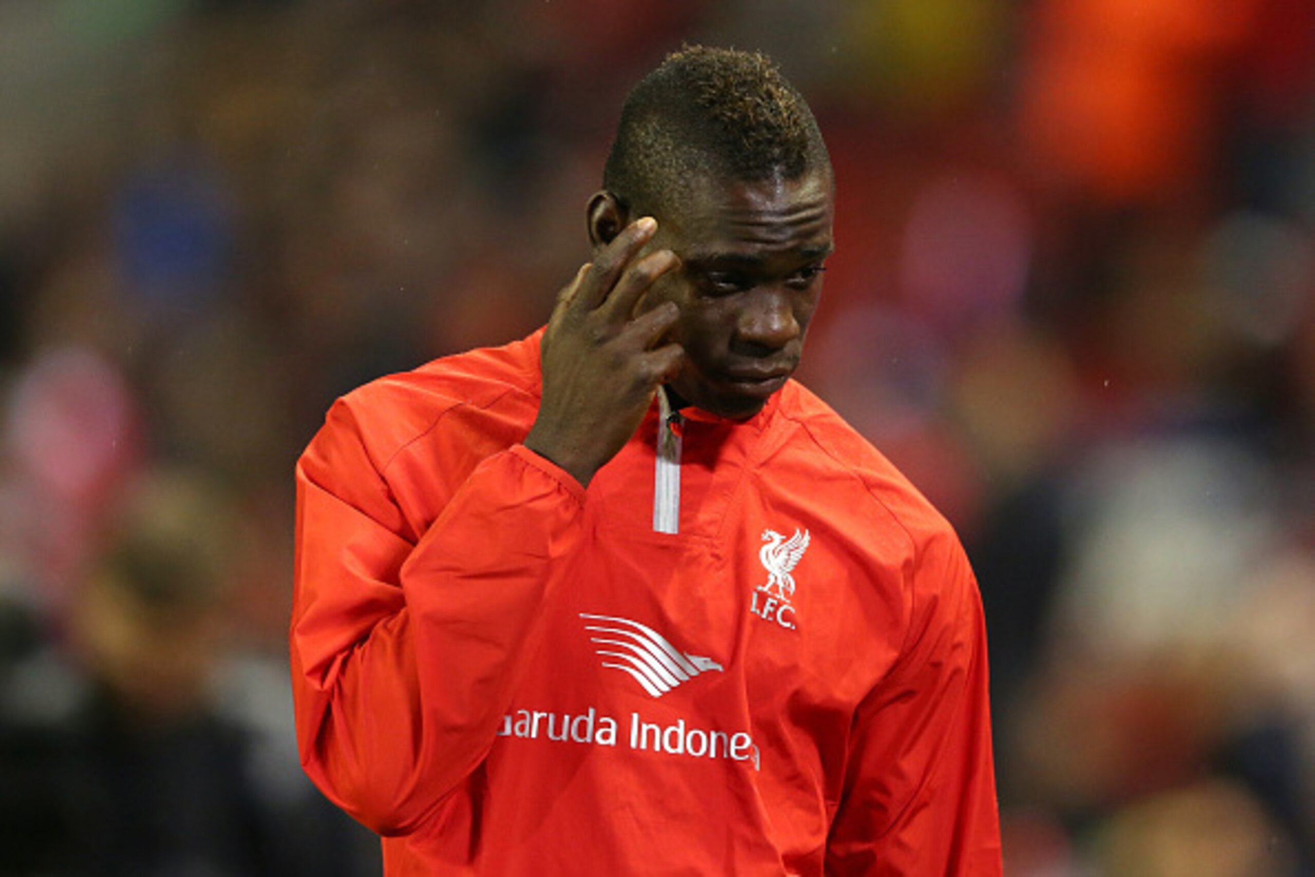 LIVERPOOL, ENGLAND - SEPTEMBER 23: Mario Balotelli of Liverpool looks on during the warm up prior to the Capital One Cup Third Round match between Liverpool and Middlesbrough at Anfield on September 23, 2014 in Liverpool, England. (Photo by Alex Livesey LIVERPOOL, ENGLAND - SEPTEMBER 23: Mario Balotelli of Liverpool looks on during the warm up prior to the Capital One Cup Third Round match between Liverpool and Middlesbrough at Anfield on September 23, 2014 in Liverpool, England. (Photo by Alex Livesey