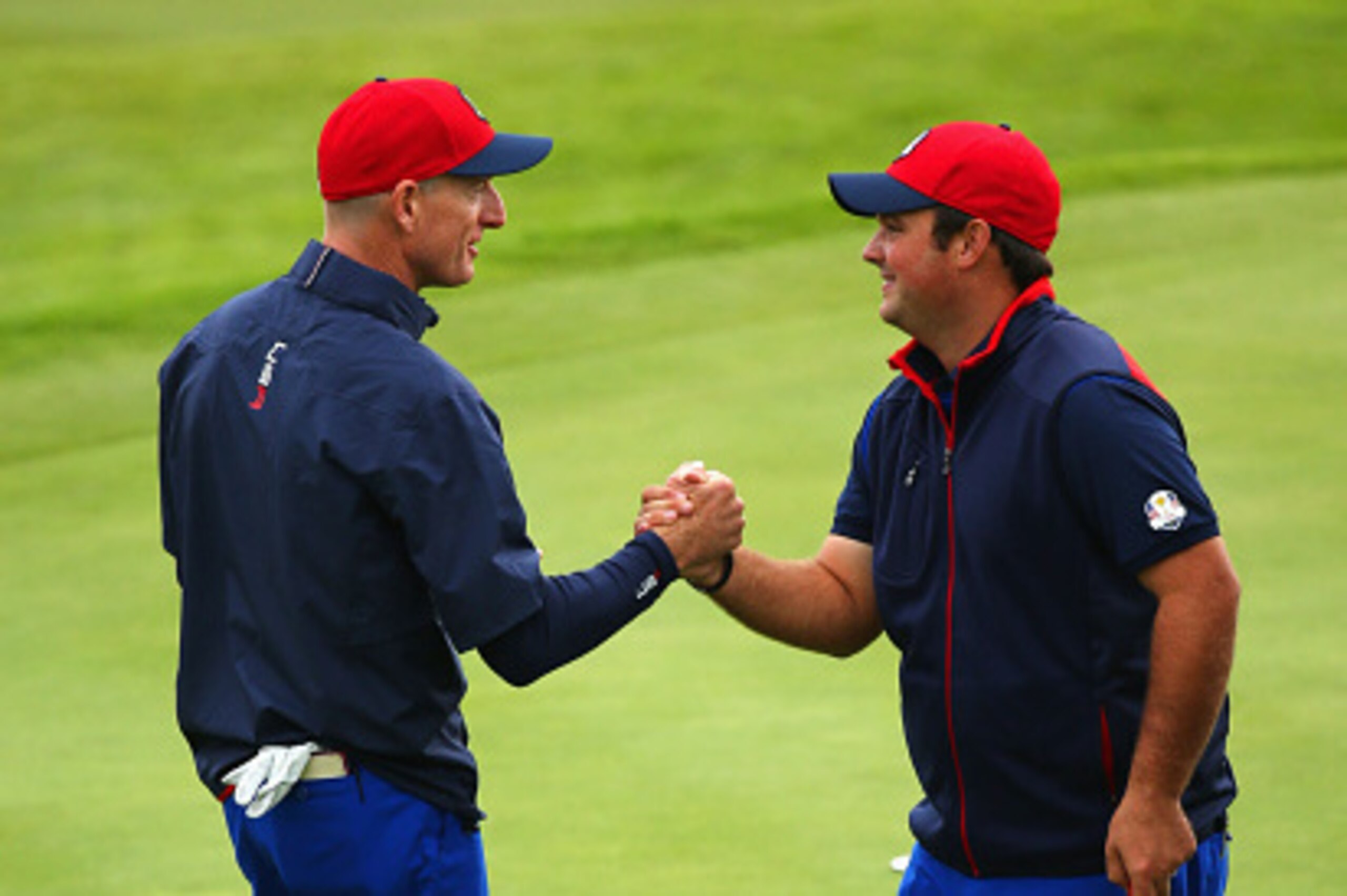AUCHTERARDER, SCOTLAND - SEPTEMBER 25: Jim Furyk (L) of the United States shakes hands with Patrick Reed of the United States during practice ahead of the 2014 Ryder Cup on the PGA Centenary course at the Gleneagles Hotel on September 25, 2014 in Auchtera