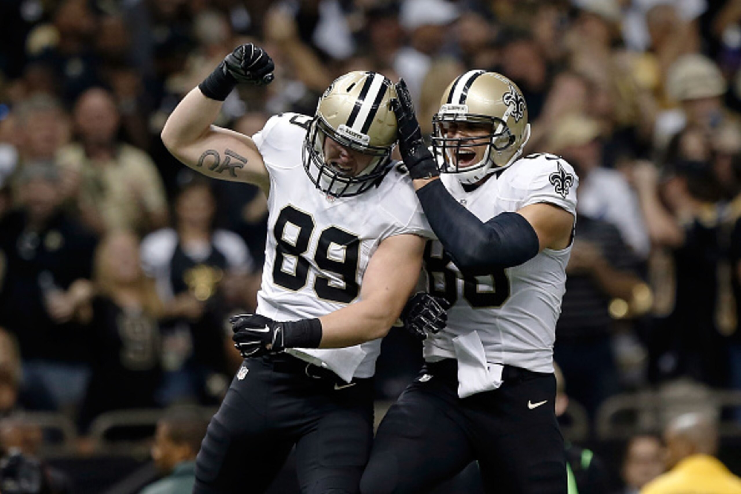 NEW ORLEANS, LA - SEPTEMBER 21:  Josh Hill and Jimmy Graham #80 of the New Orleans Saints celebrate a touchdown during the first quarter of a game against the Minnesota Vikings at the Mercedes-Benz Superdome on September 21, 2014 in New Orleans, Louisiana