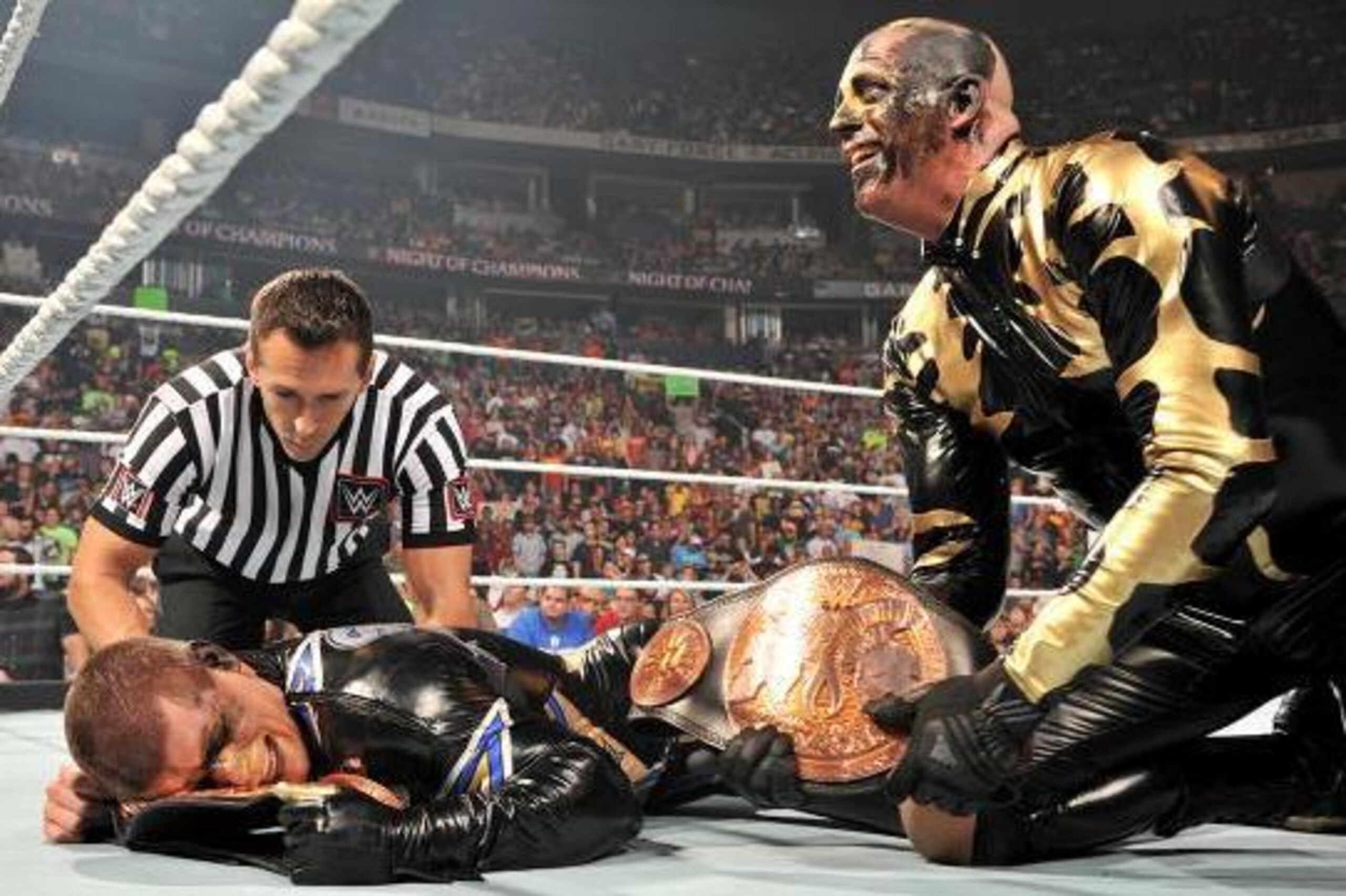 Stardust and Goldust celebrate their title win.