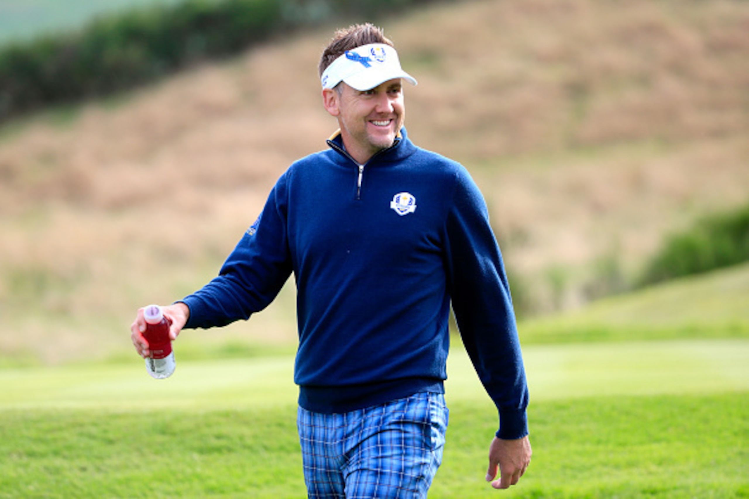 AUCHTERARDER, SCOTLAND - SEPTEMBER 23:  Ian Poulter of Europe smiles during practice ahead of the 2014 Ryder Cup on the PGA Centenary course at the Gleneagles Hotel on September 23, 2014 in Auchterarder, Scotland.  (Photo by Harry How/Getty Images)