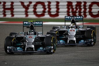 SAKHIR, BAHRAIN - APRIL 06:  Nico Rosberg (L) of Germany and Mercedes GP and team mate  Lewis Hamilton (R) of Great Britain and Mercedes GP battle for the lead during Bahrain Formula One Grand Prix at the Bahrain International Circuit on April 6, 2014 in 