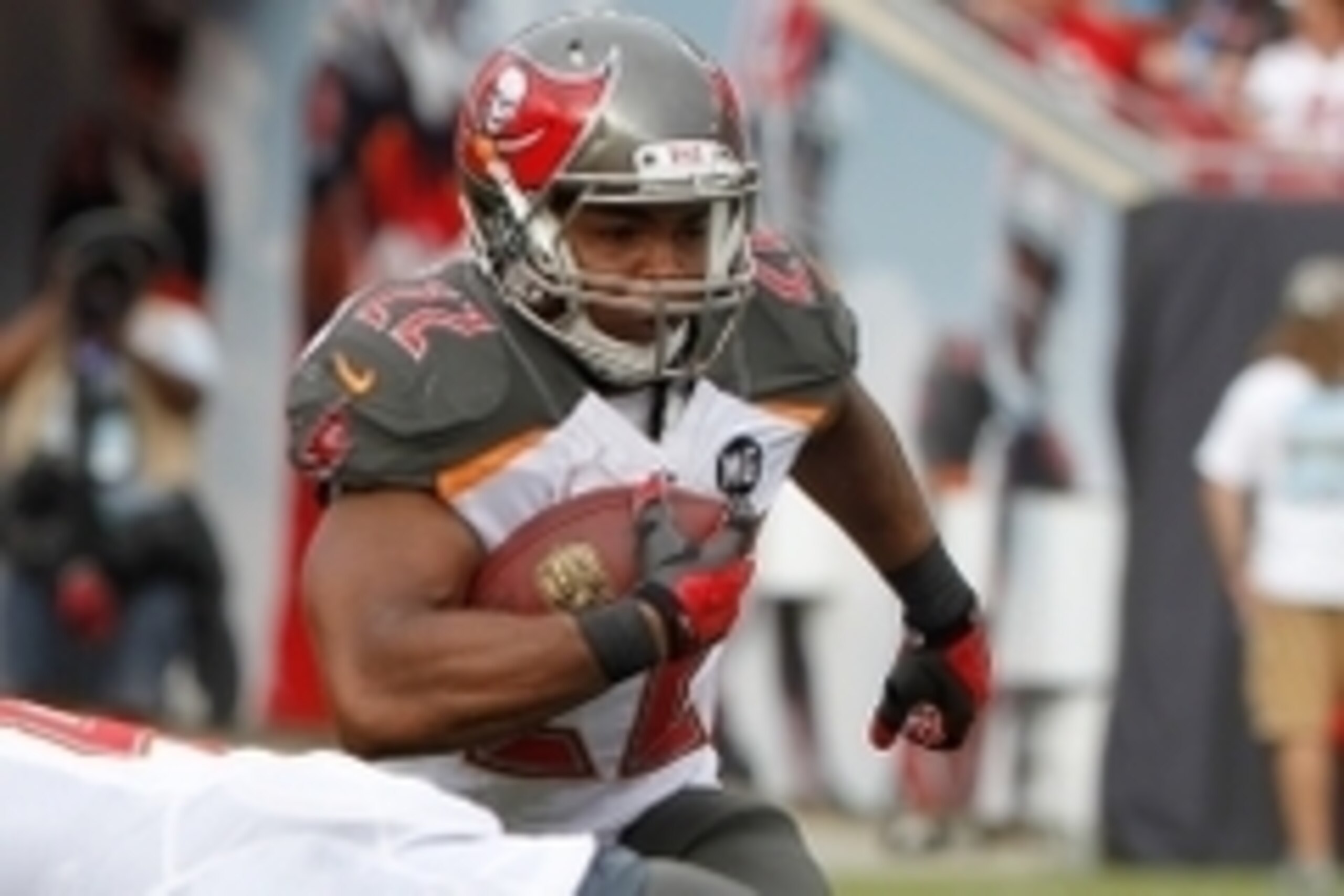 Sep 7, 2014; Tampa, FL, USA; Tampa Bay Buccaneers running back Doug Martin (22) runs with the ball during the first half against the Carolina Panthers at Raymond James Stadium. Mandatory Credit: Kim Klement-USA TODAY Sports