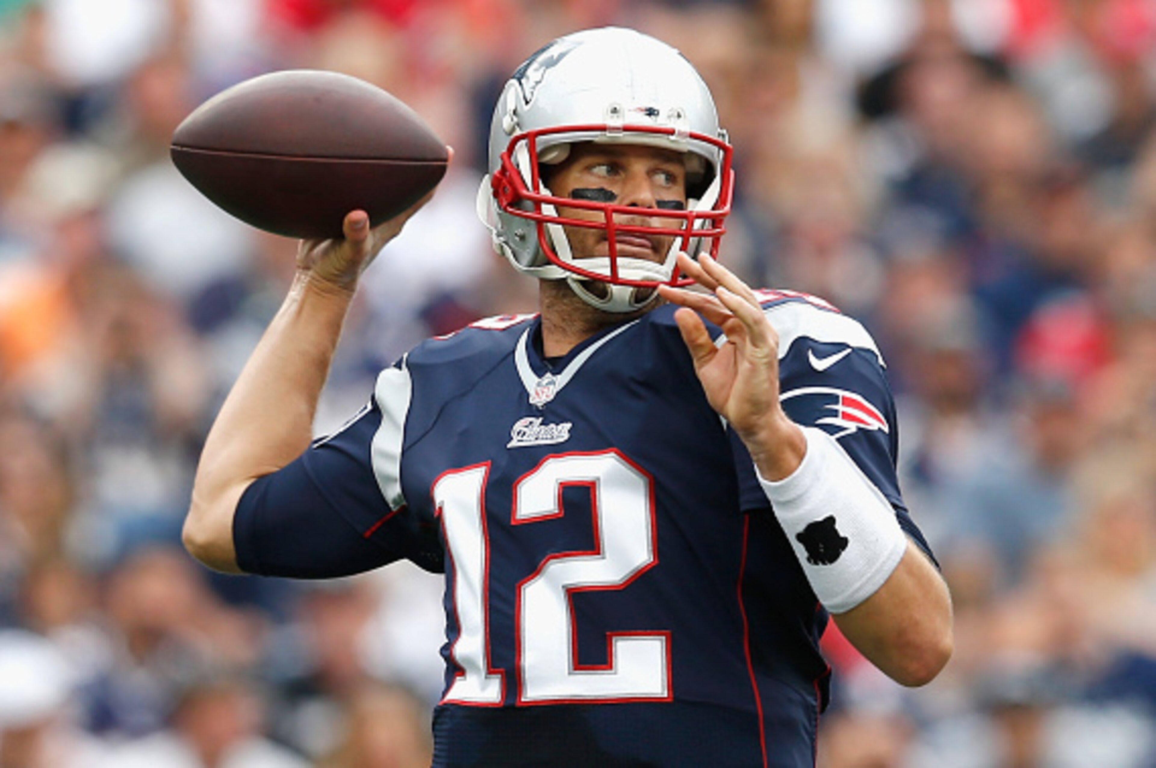 FOXBORO, MA - SEPTEMBER 21: Tom Brady #12 of the New England Patriots throws the ball during the second quarter against the Oakland Raiders at Gillette Stadium on September 21, 2014 in Foxboro, Massachusetts. (Photo by Jim Rogash/Getty Images) FOXBORO, MA - SEPTEMBER 21: Tom Brady #12 of the New England Patriots throws the ball during the second quarter against the Oakland Raiders at Gillette Stadium on September 21, 2014 in Foxboro, Massachusetts. (Photo by Jim Rogash/Getty Images)