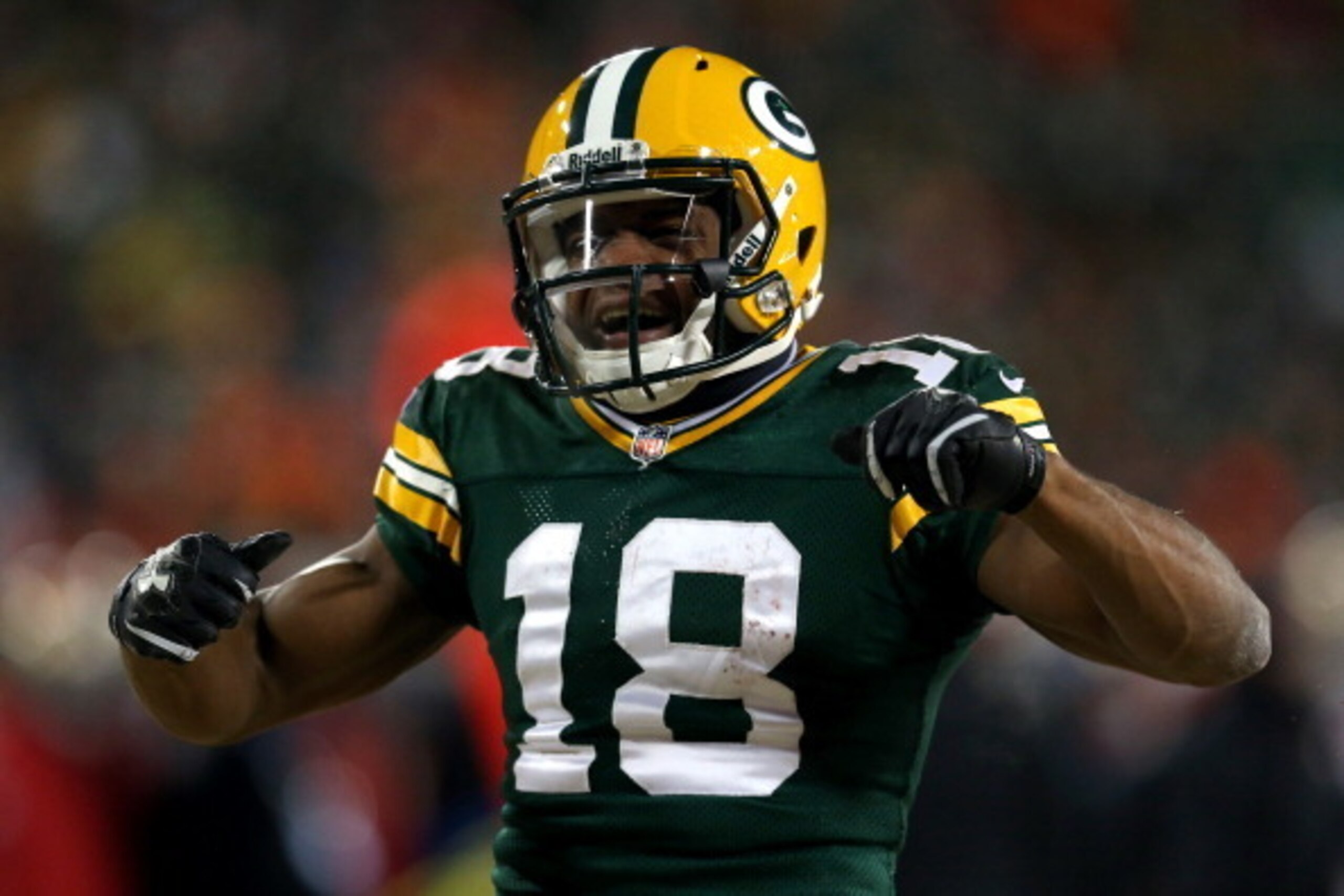 GREEN BAY, WI - JANUARY 05:  Randall Cobb #18 of the Green Bay Packers celebrates after a first down catch in the fourth quarter against the San Francisco 49ers during their NFC Wild Card Playoff game at Lambeau Field on January 5, 2014 in Green Bay, Wisc