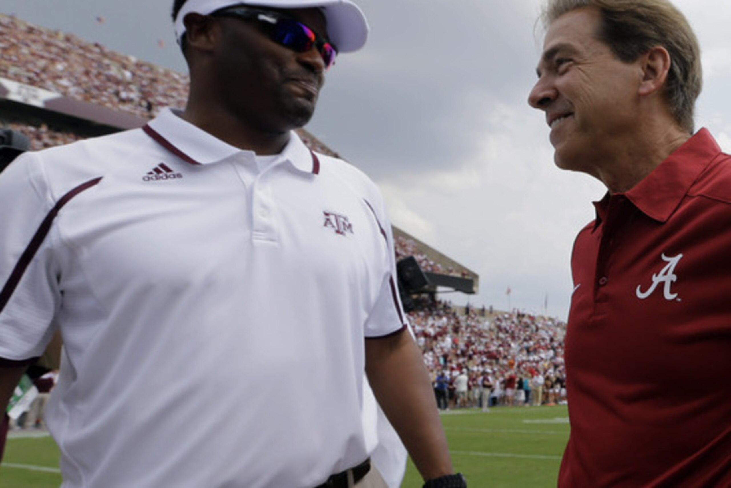 Texas A&M head coach Kevin Sumlin (left) and Alabama head coach Nick Saban. Texas A&M head coach Kevin Sumlin (left) and Alabama head coach Nick Saban.