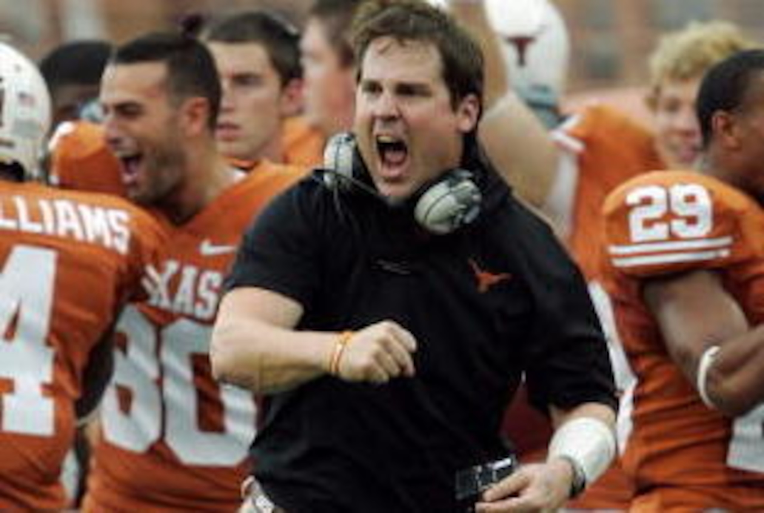 AUSTIN, TX - SEPTEMBER 5: Defensive coordinator Will Muschamp of the Texas Longhorns gets pumped up after a turnover by the Louisiana Monroe Warhawks in the first quarter on September 5, 2009 at Darrell K Royal-Texas Memorial Stadium in Austin, Texas. ( AUSTIN, TX - SEPTEMBER 5: Defensive coordinator Will Muschamp of the Texas Longhorns gets pumped up after a turnover by the Louisiana Monroe Warhawks in the first quarter on September 5, 2009 at Darrell K Royal-Texas Memorial Stadium in Austin, Texas. (