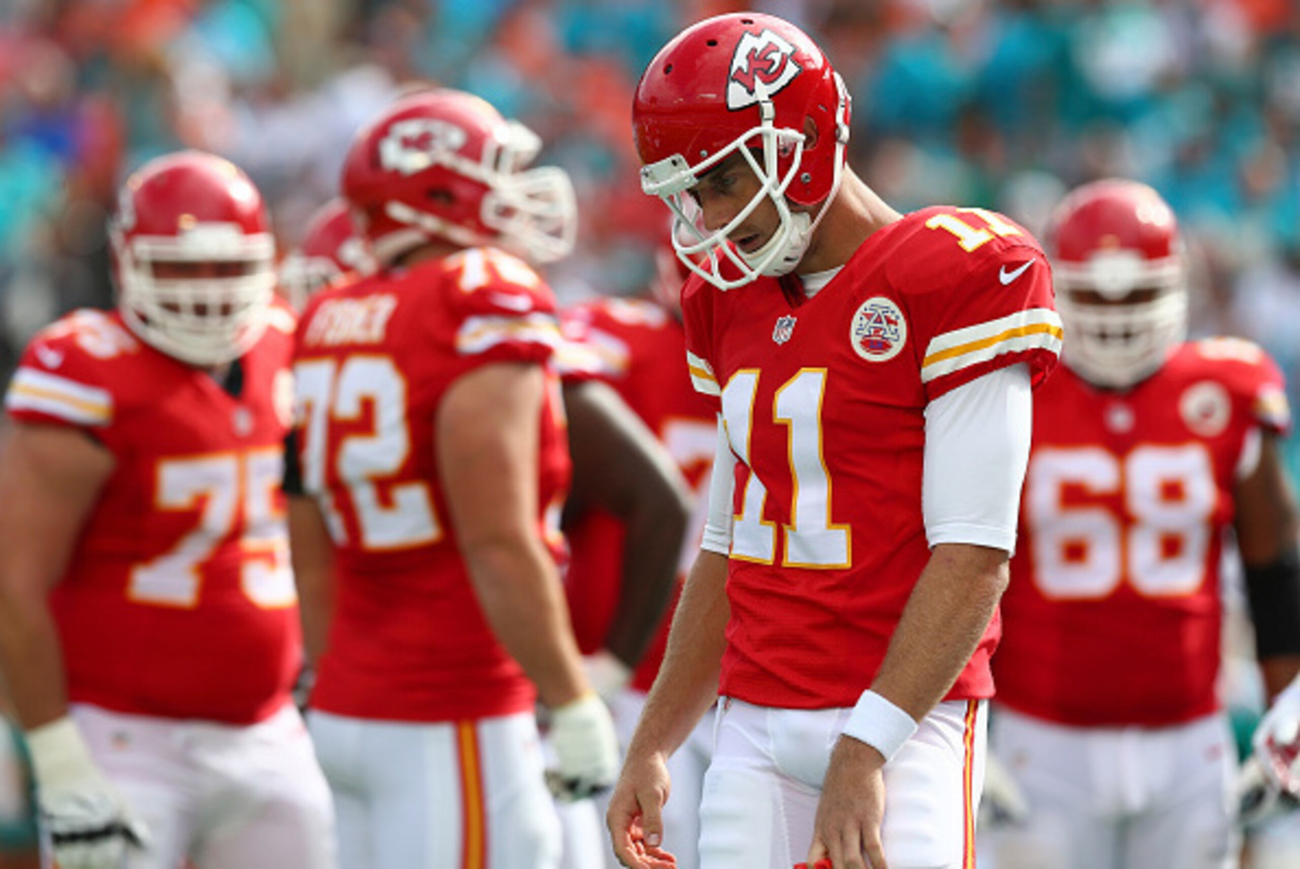 MIAMI GARDENS, FL - SEPTEMBER 21: Quarterback Alex Smith #11 of the Kansas City Chiefs reacts during a time out during a game against the Miami Dolphins at Sun Life Stadium on September 21, 2014 in Miami Gardens, Florida. (Photo by Ronald Martinez/Getty MIAMI GARDENS, FL - SEPTEMBER 21: Quarterback Alex Smith #11 of the Kansas City Chiefs reacts during a time out during a game against the Miami Dolphins at Sun Life Stadium on September 21, 2014 in Miami Gardens, Florida. (Photo by Ronald Martinez/Getty
