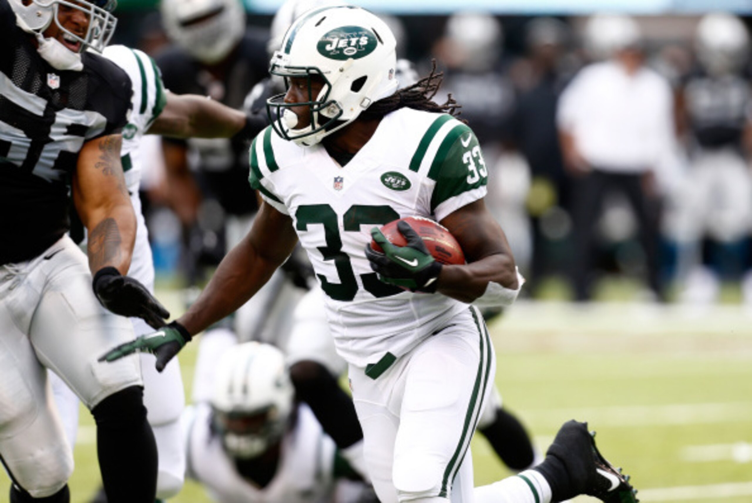 EAST RUTHERFORD, NJ - SEPTEMBER 07: Chris Ivory #33 of the New York Jets rushes the ball against the Oakland Raiders in the first quarter at MetLife Stadium on September 7, 2014 in East Rutherford, New Jersey. (Photo by Jeff Zelevansky/Getty Images) EAST RUTHERFORD, NJ - SEPTEMBER 07: Chris Ivory #33 of the New York Jets rushes the ball against the Oakland Raiders in the first quarter at MetLife Stadium on September 7, 2014 in East Rutherford, New Jersey. (Photo by Jeff Zelevansky/Getty Images)