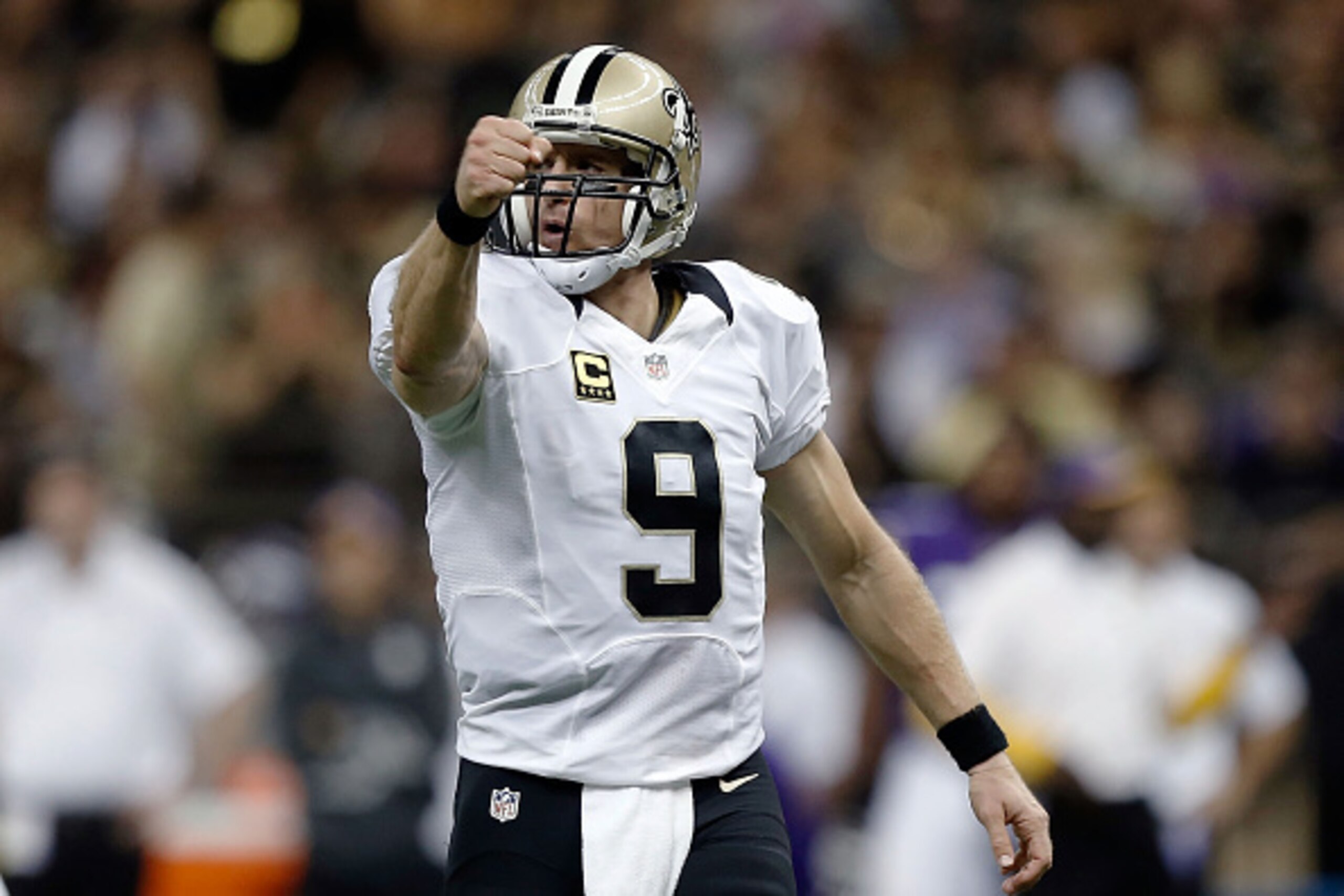 NEW ORLEANS, LA - SEPTEMBER 21:  Drew Brees #9 of the New Orleans Saints reacts to a first down during the fourth quarter of a game against the Minnesota Vikings at the Mercedes-Benz Superdome on September 21, 2014 in New Orleans, Louisiana.  (Photo by Se
