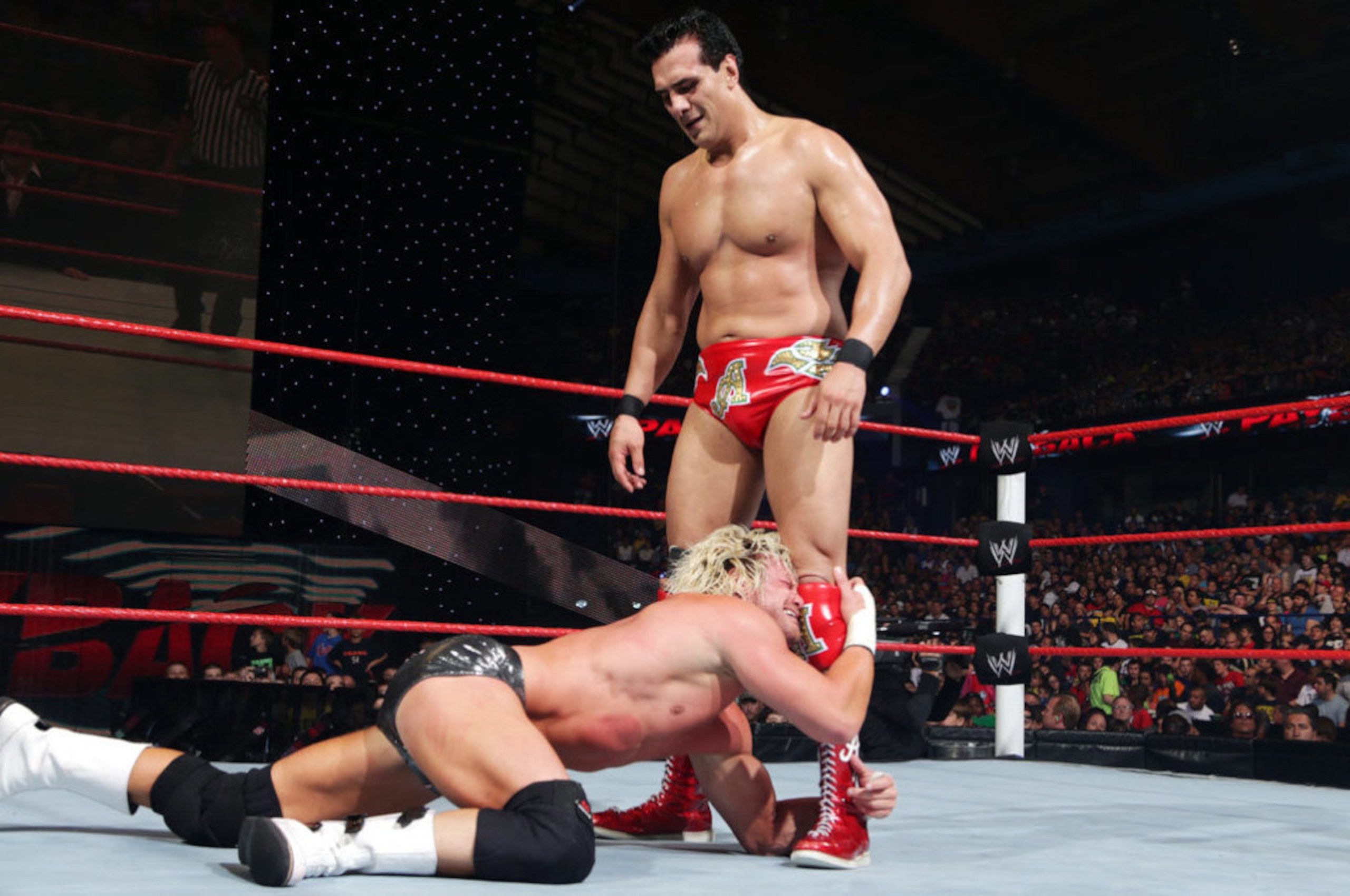 Alberto Del Rio stands over Dolph Ziggler. Alberto Del Rio stands over Dolph Ziggler.