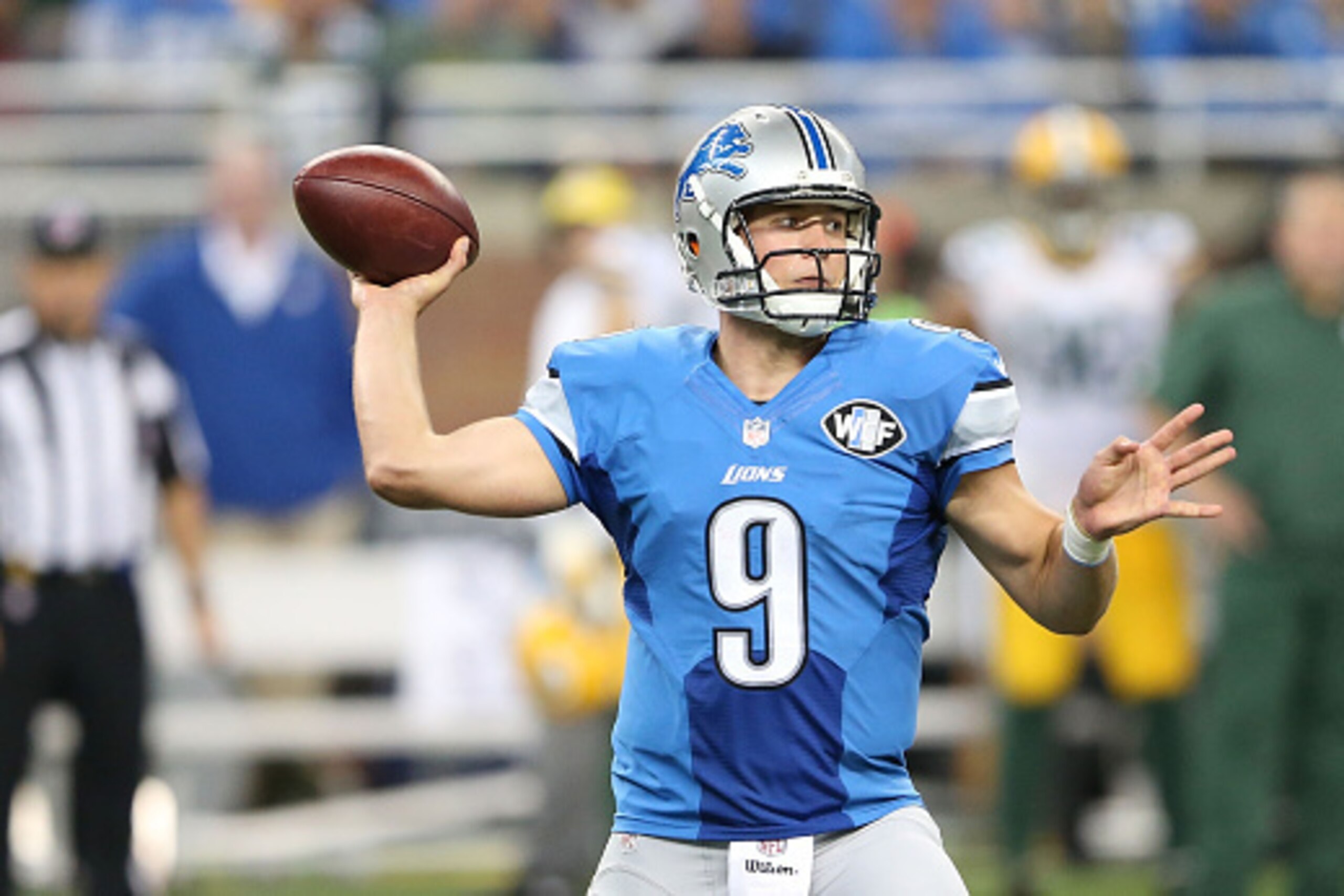 DETROIT, MI - SEPTEMBER 21:  Matthew Stafford #9 of the Detroit Lions drops back to pass during the third quarter of the game against the Green Bay Packers at Ford Field on September 21, 2014 in Detroit, Michigan. The Lions defeated the Packers 19-7.  (Ph