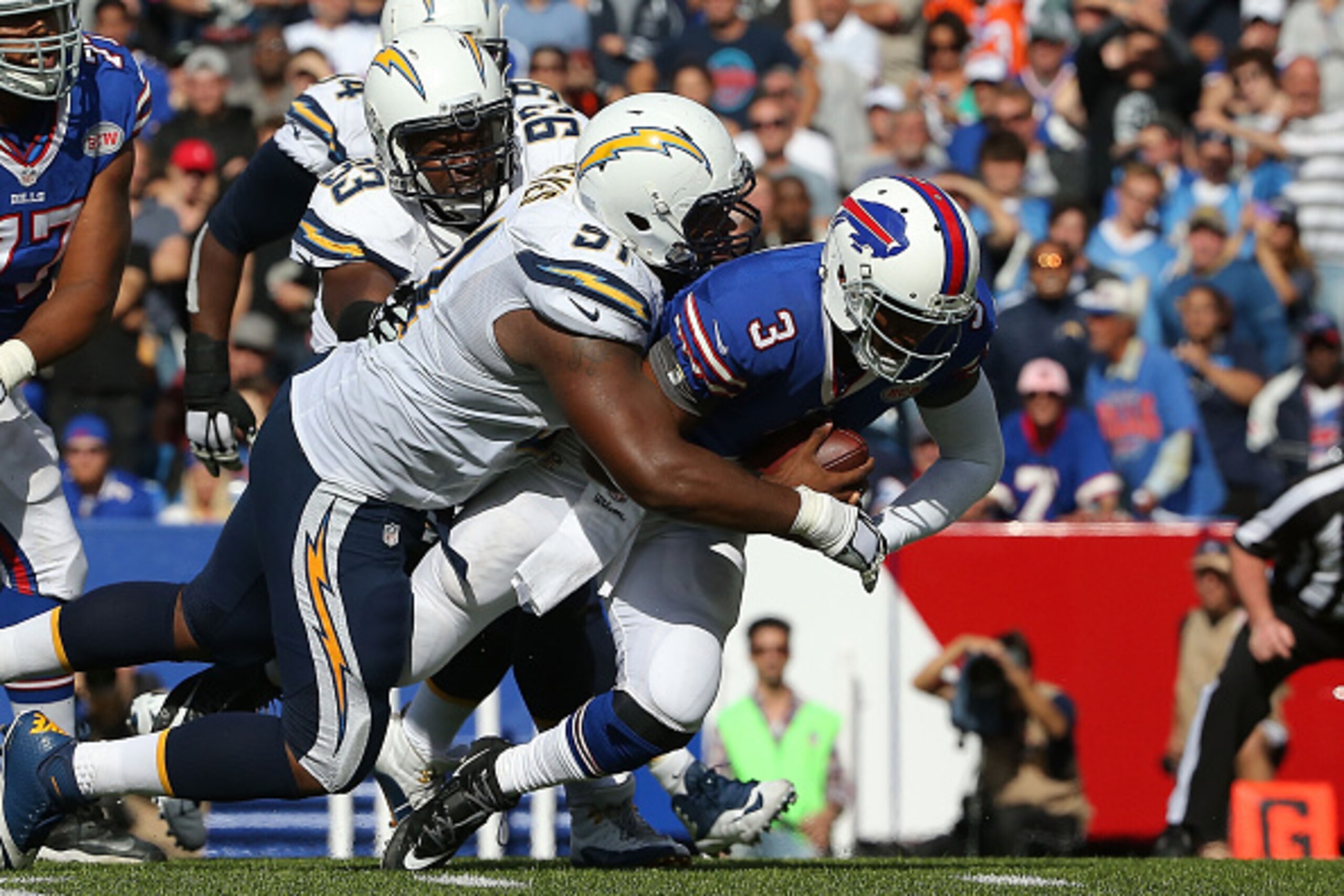 ORCHARD PARK, NY - SEPTEMBER 21:  EJ Manuel #3 of the Buffalo Bills is sacked by Kendall Reyes #91 of the San Diego Chargers during the second half at Ralph Wilson Stadium on September 21, 2014 in Orchard Park, New York.  (Photo by Tom Szczerbowski/Getty 