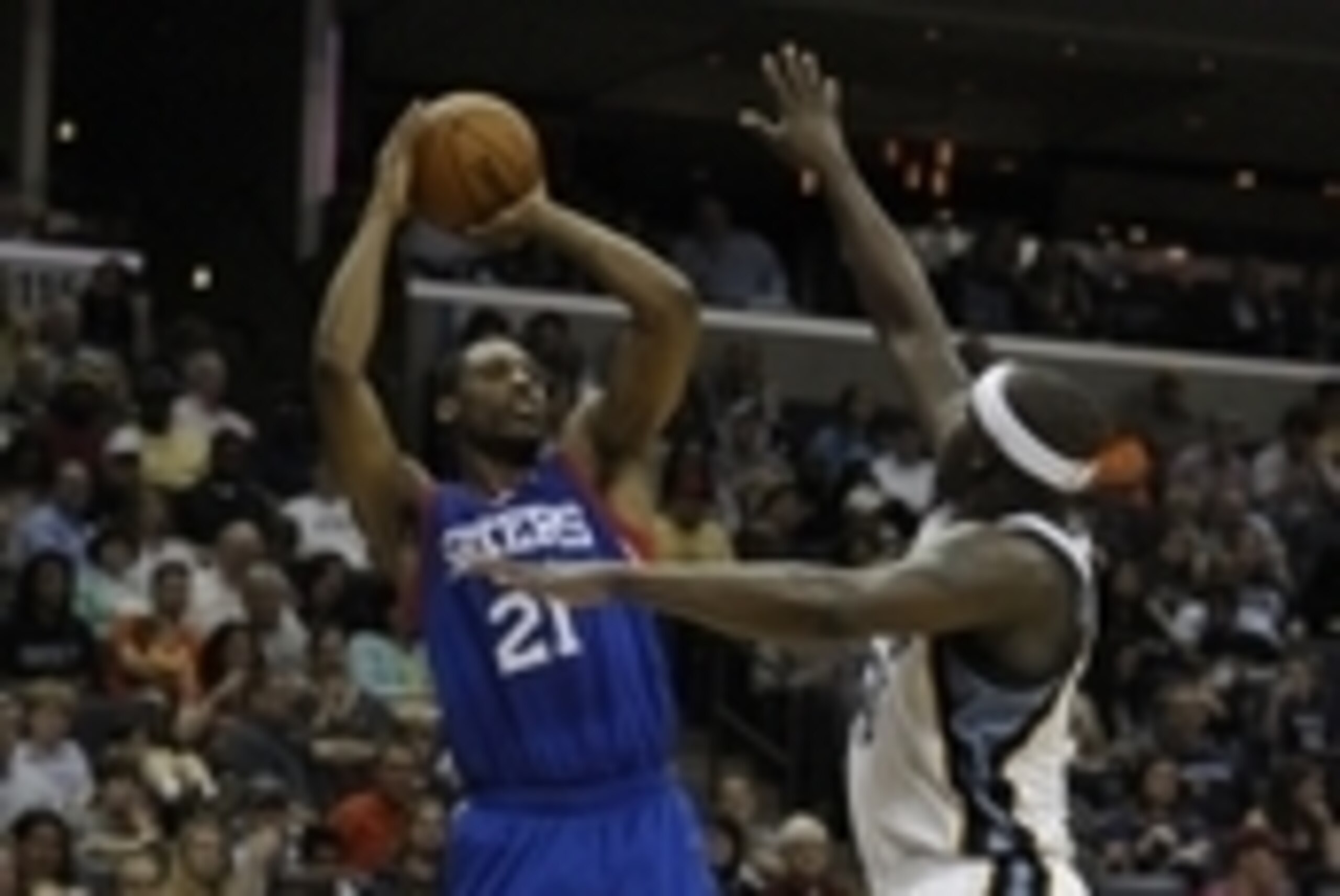 Apr 11, 2014; Memphis, TN, USA; Philadelphia 76ers forward Thaddeus Young (21) shoots over Memphis Grizzlies forward Zach Randolph (50) during the game at FedExForum. Memphis Grizzlies beat Philadelphia 76ers 117 - 95. Mandatory Credit: Justin Ford-USA TO