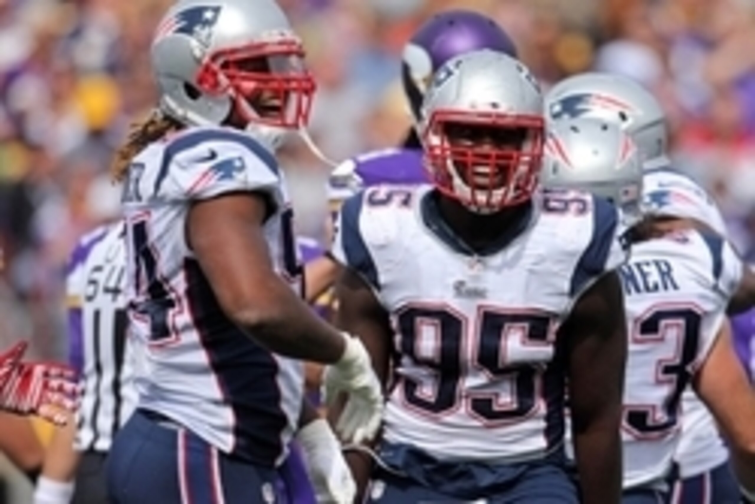 Sep 14, 2014; Minneapolis, MN, USA; New England Patriots linebacker Dont'a Hightower (54) celebrates with defensive end Chandler Jones (95) during the third quarter against the Minnesota Vikings at TCF Bank Stadium. The Patriots defeated the Vikings 30-7.
