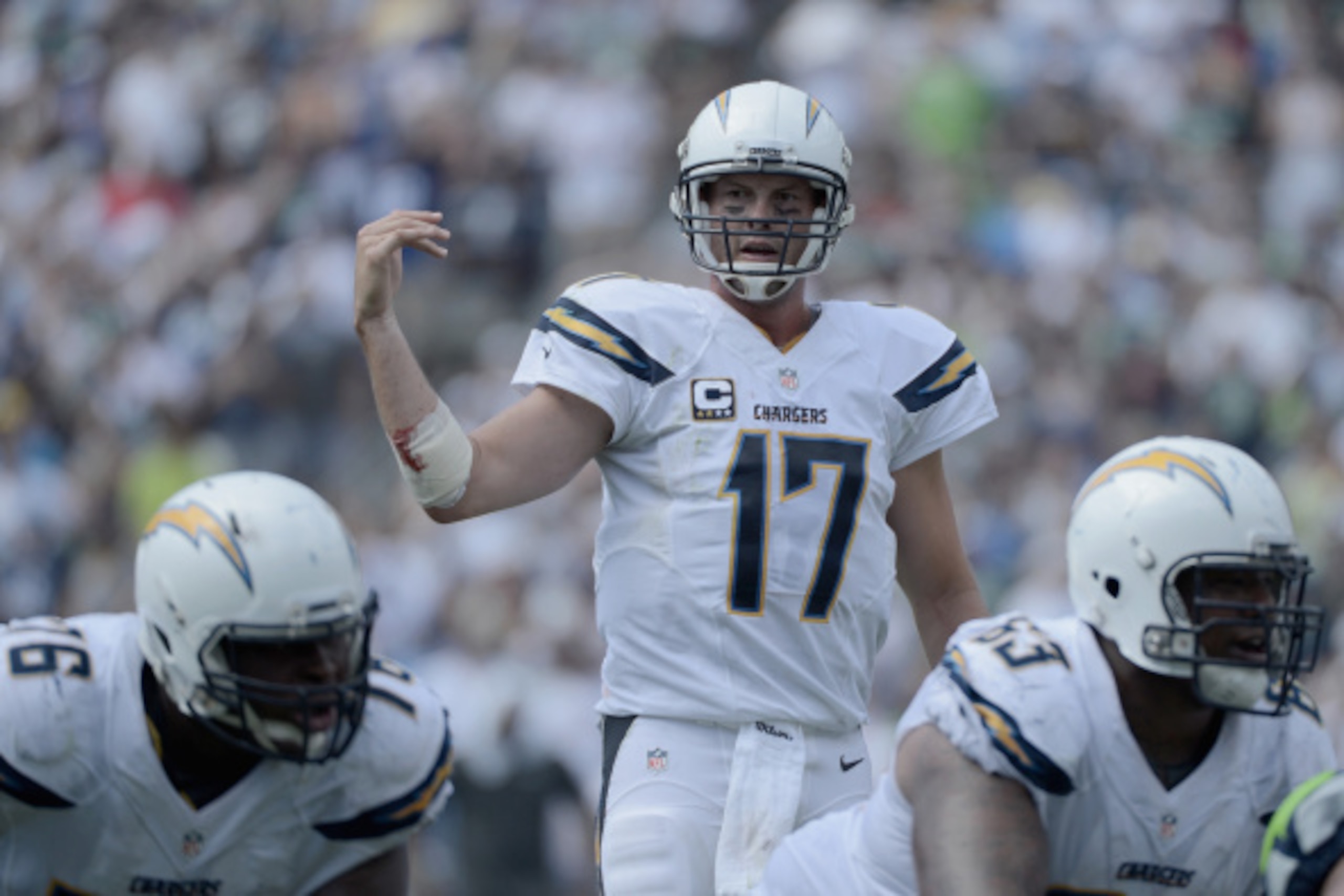 SAN DIEGO, CA - SEPTEMBER 14: Quarterback Philip Rivers #17 of the San Diego Chargers calls a play during a game against the Seattle Seahawks at Qualcomm Stadium on September 14, 2014 in San Diego, California.  (Photo by Donald Miralle/Getty Images)