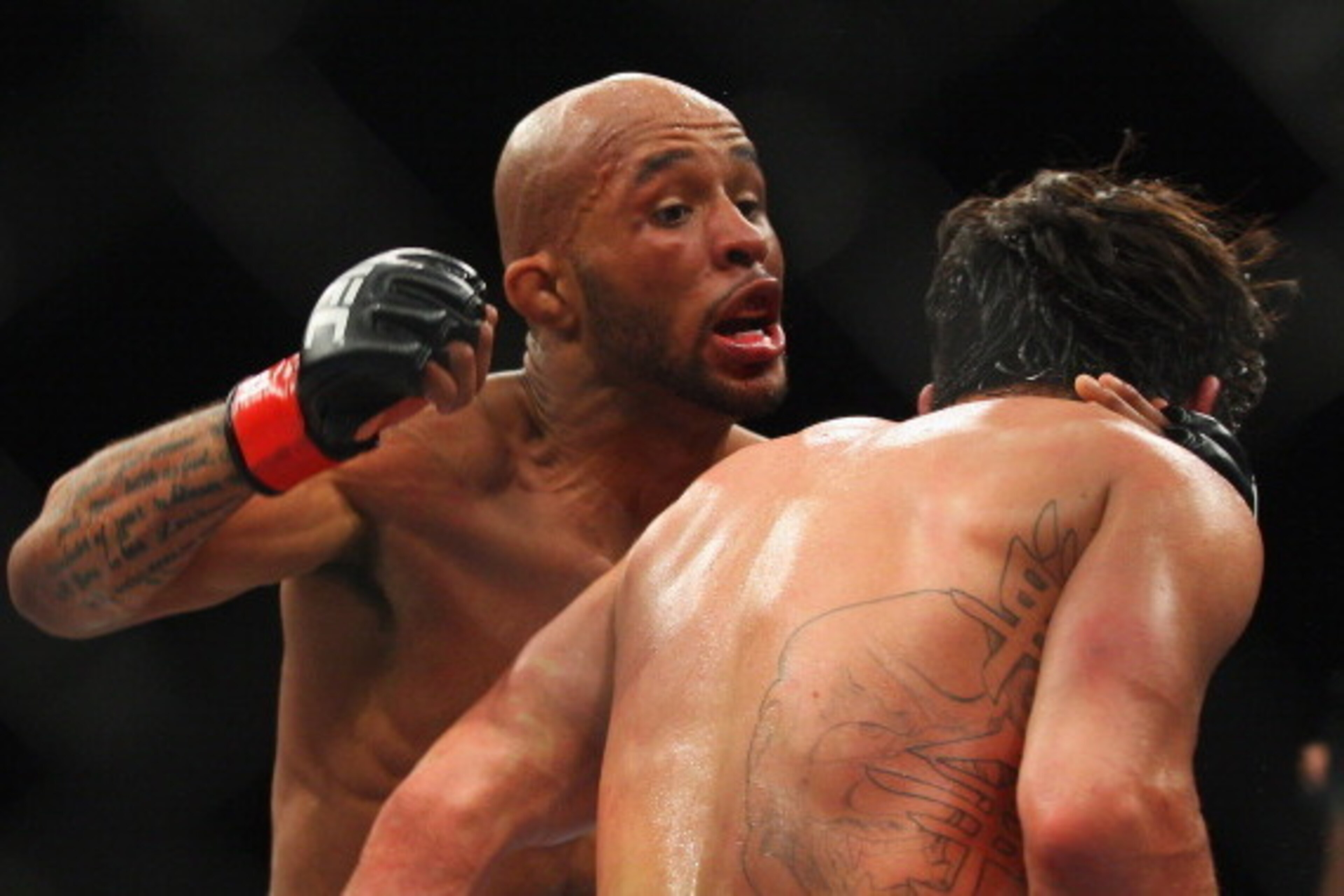 SYDNEY, AUSTRALIA - MARCH 03:  Demetrious Johnson of the USA and Ian McCall of the USA fight during the UFC On FX flyweight bout between Demetrious Johnson and Ian McCall at Allphones Arena on March 3, 2012 in Sydney, Australia.  (Photo by Mark Kolbe/Gett