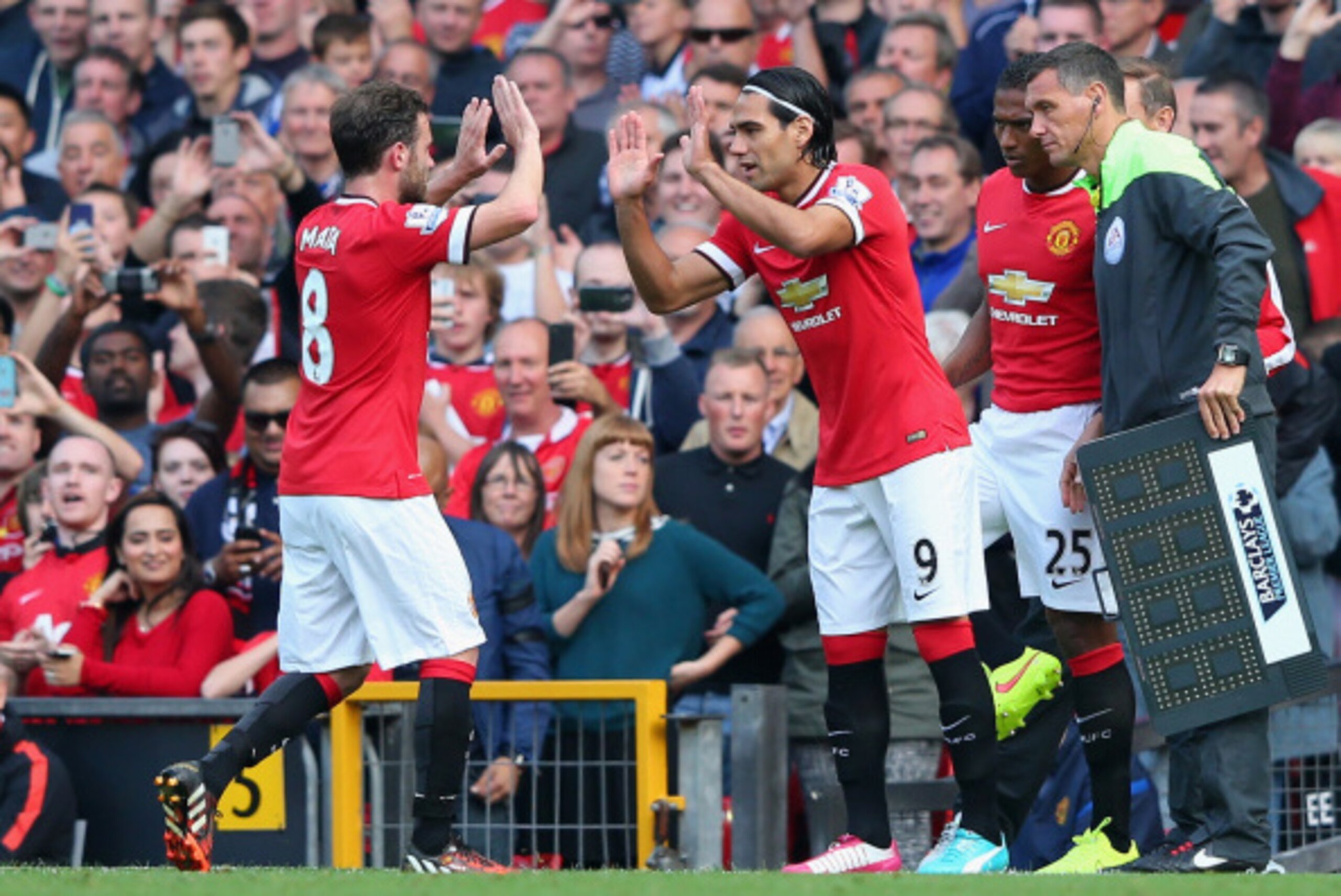 MANCHESTER, ENGLAND - SEPTEMBER 14:  Radamel Falcao of Manchester United comes on as a substitute for Juan Mata to make his debut during the Barclays Premier League match between Manchester United and Queens Park Rangers at Old Trafford on September 14, 2
