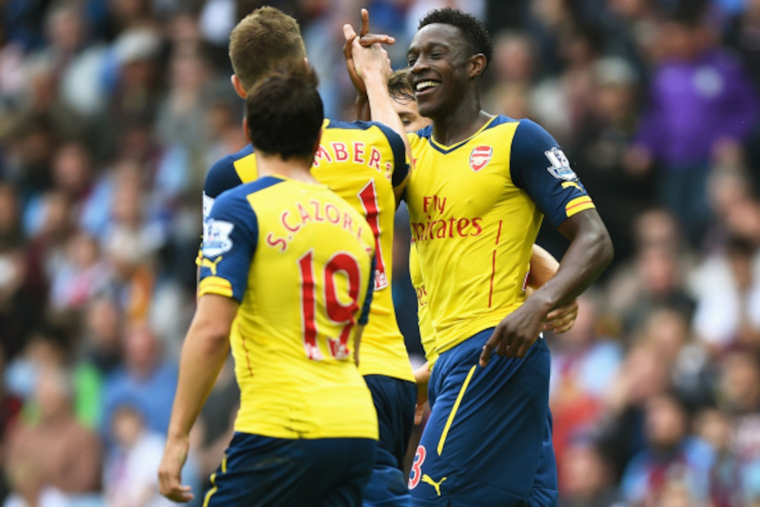 BIRMINGHAM, ENGLAND - SEPTEMBER 20:  Danny Welbeck of Arsenal celebrates his team's second goal during the Barclays Premier League match between Aston Villa and Arsenal at Villa Park on September 20, 2014 in Birmingham, England.  (Photo by Laurence Griffi