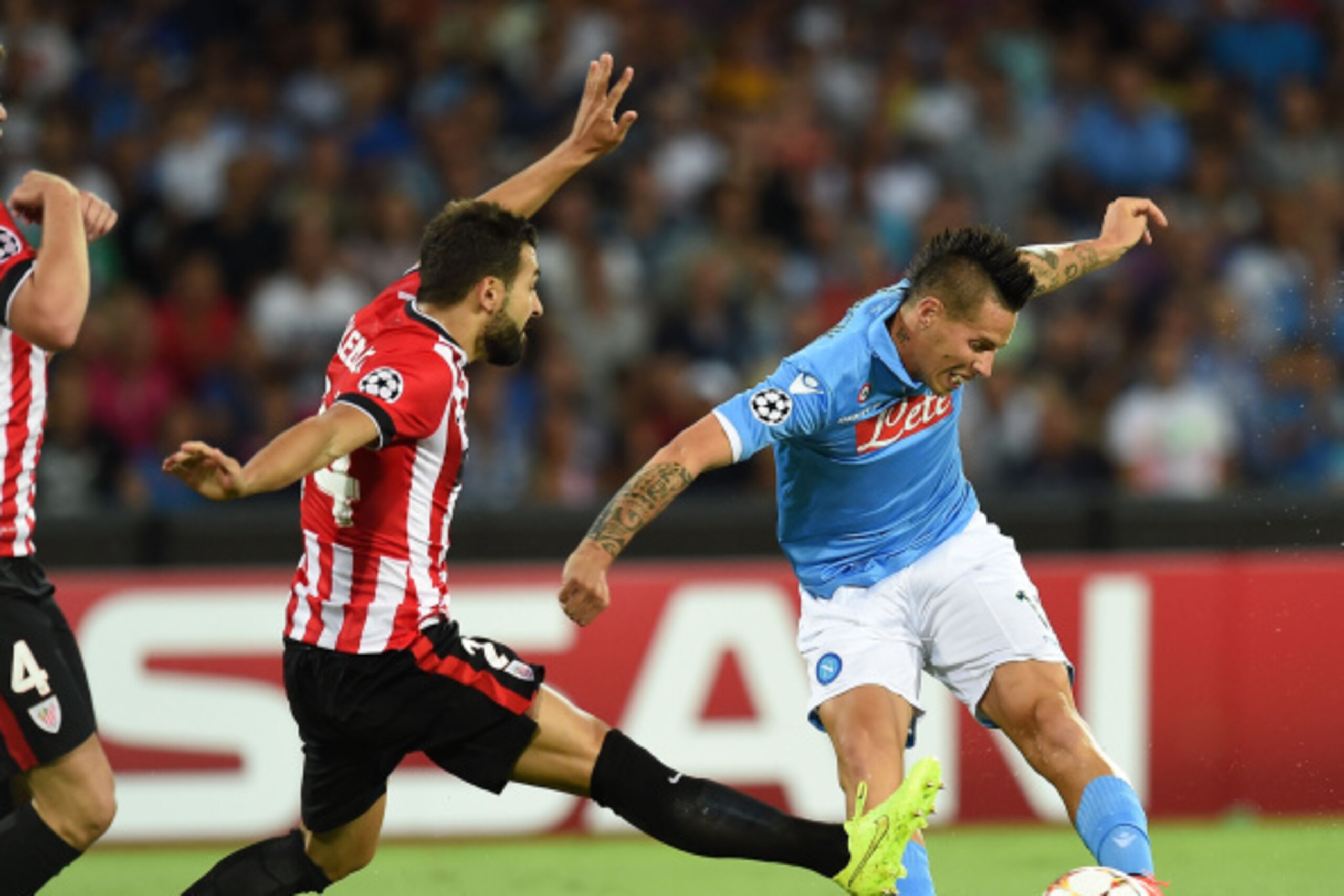 NAPLES, ITALY - AUGUST 19:  Mikel Balenziaga of Athletic Bilbao and Marek Hamsik of Napoli in action during the UEFA Champions League qualifying play-off first leg match  between SSC Napoli and Athletic Club on August 19, 2014 in Naples, Italy.  (Photo by