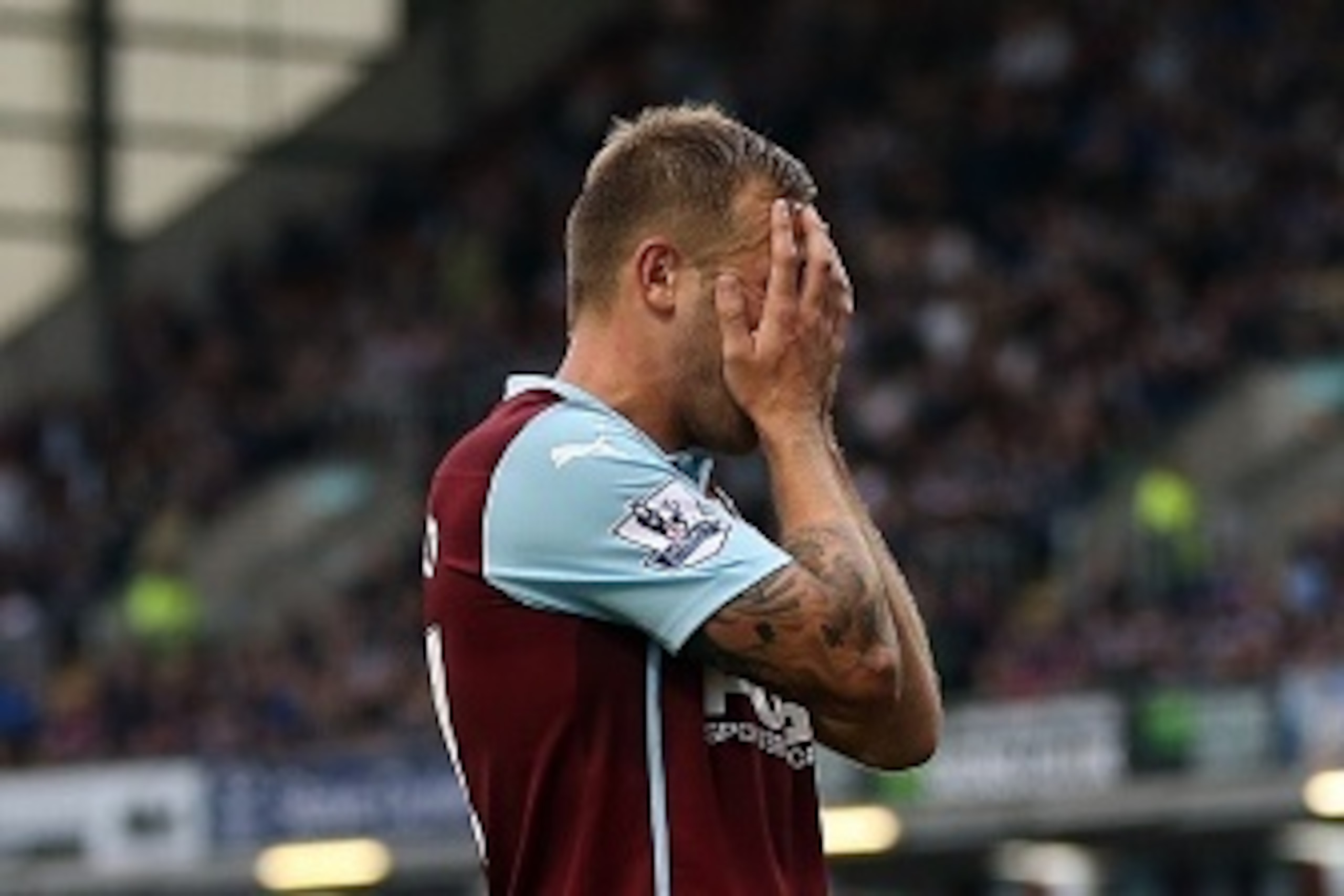 BURNLEY, ENGLAND - SEPTEMBER 20: Scott Arfield of Burnley reacts during the Barclays Premier League match between Burnley and Sunderland at Turf Moor on September 20, 2014 in Burnley, England. (Photo by Chris Brunskill/Getty Images)