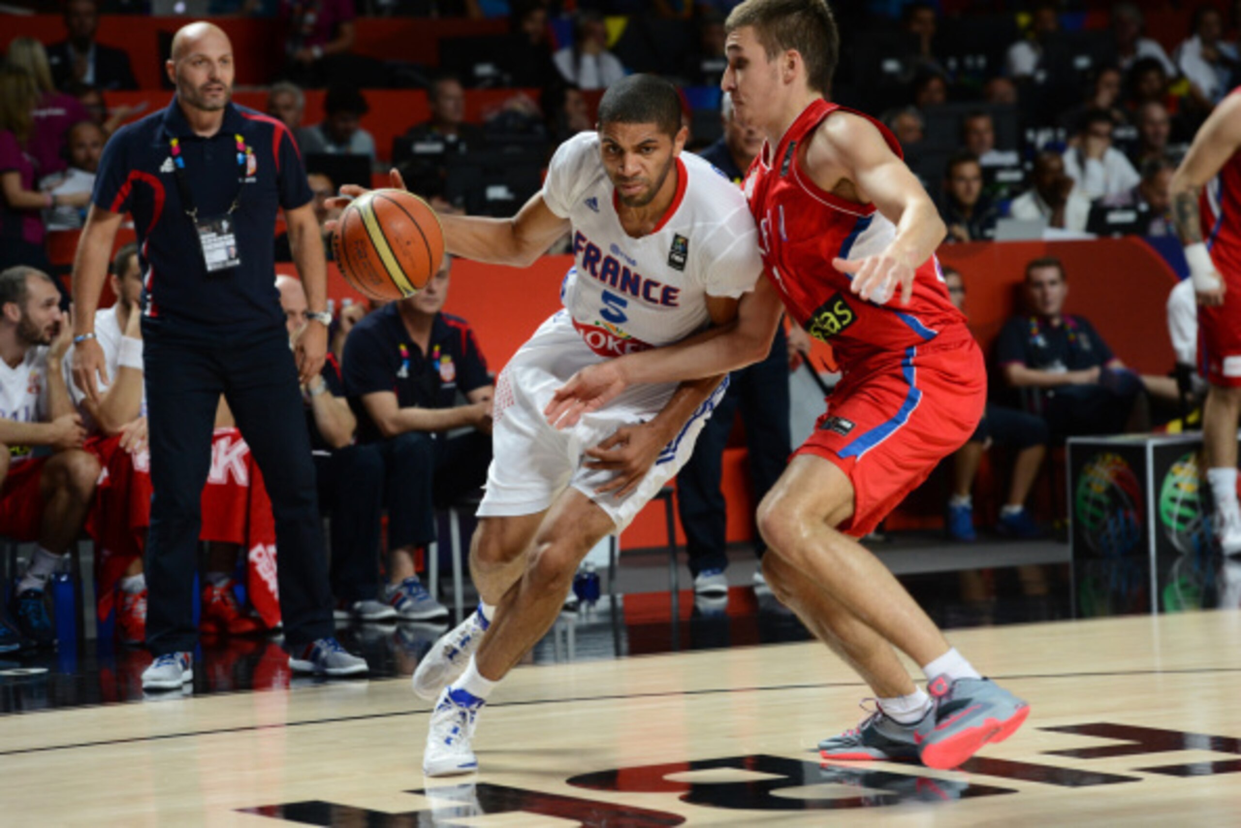 MADRID, SPAIN - SEPTEMBER 12: Nicolas Batum #5 of the France National Team drives against the Serbia National Team at Palacio de Deportes on September 12, 2014 in Madrid, Spain.  NOTE TO USER: User expressly acknowledges and agrees that, by downloading an