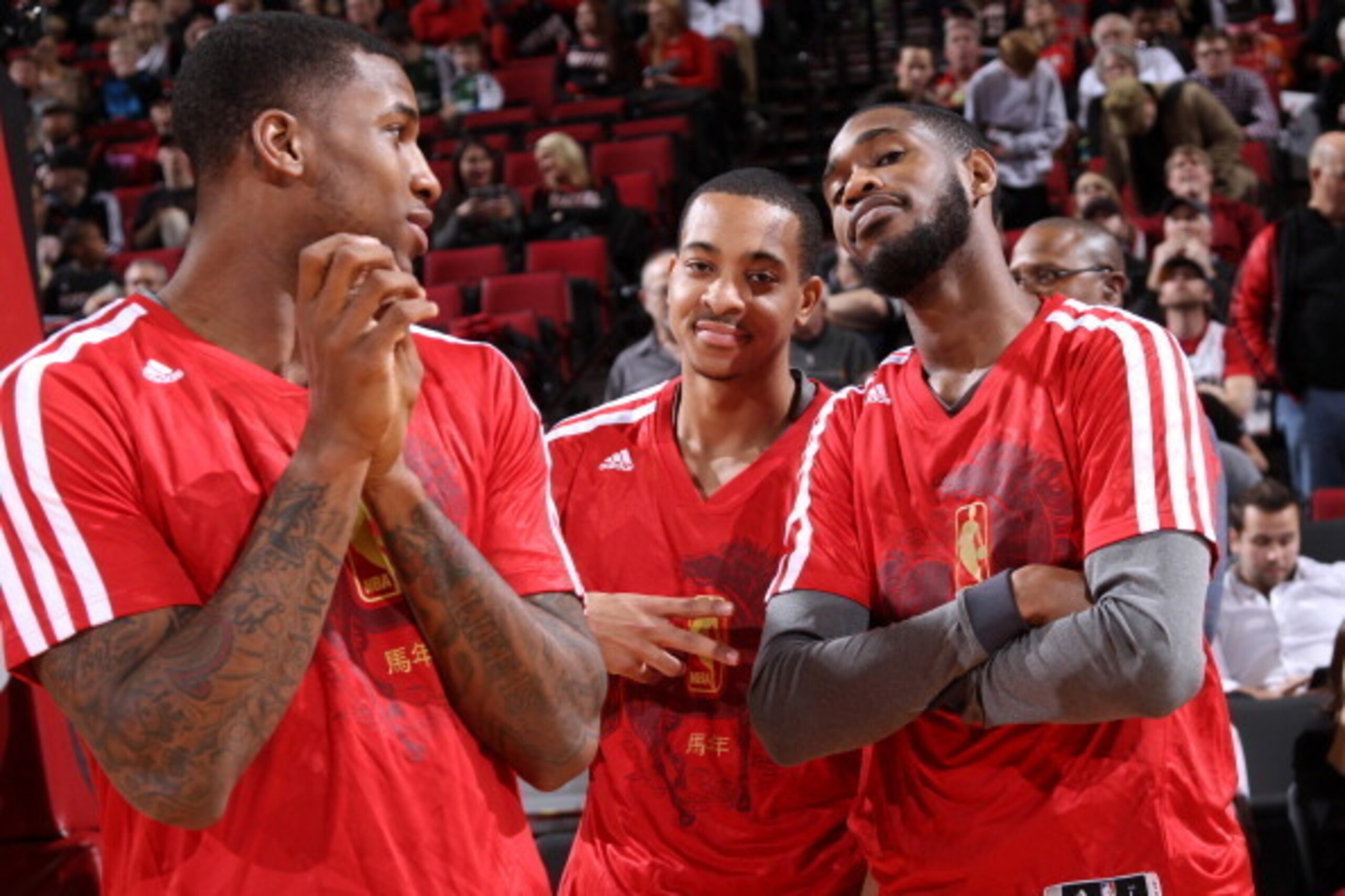 PORTLAND, OR - JANUARY 28:  Thomas Robinson #41, C.J. McCollum #3 and Will Barton #5 of the Portland Trail Blazers have fun before the game against the Memphis Grizzlies on January 28, 2014 at the Moda Center Arena in Portland, Oregon. NOTE TO USER: User 
