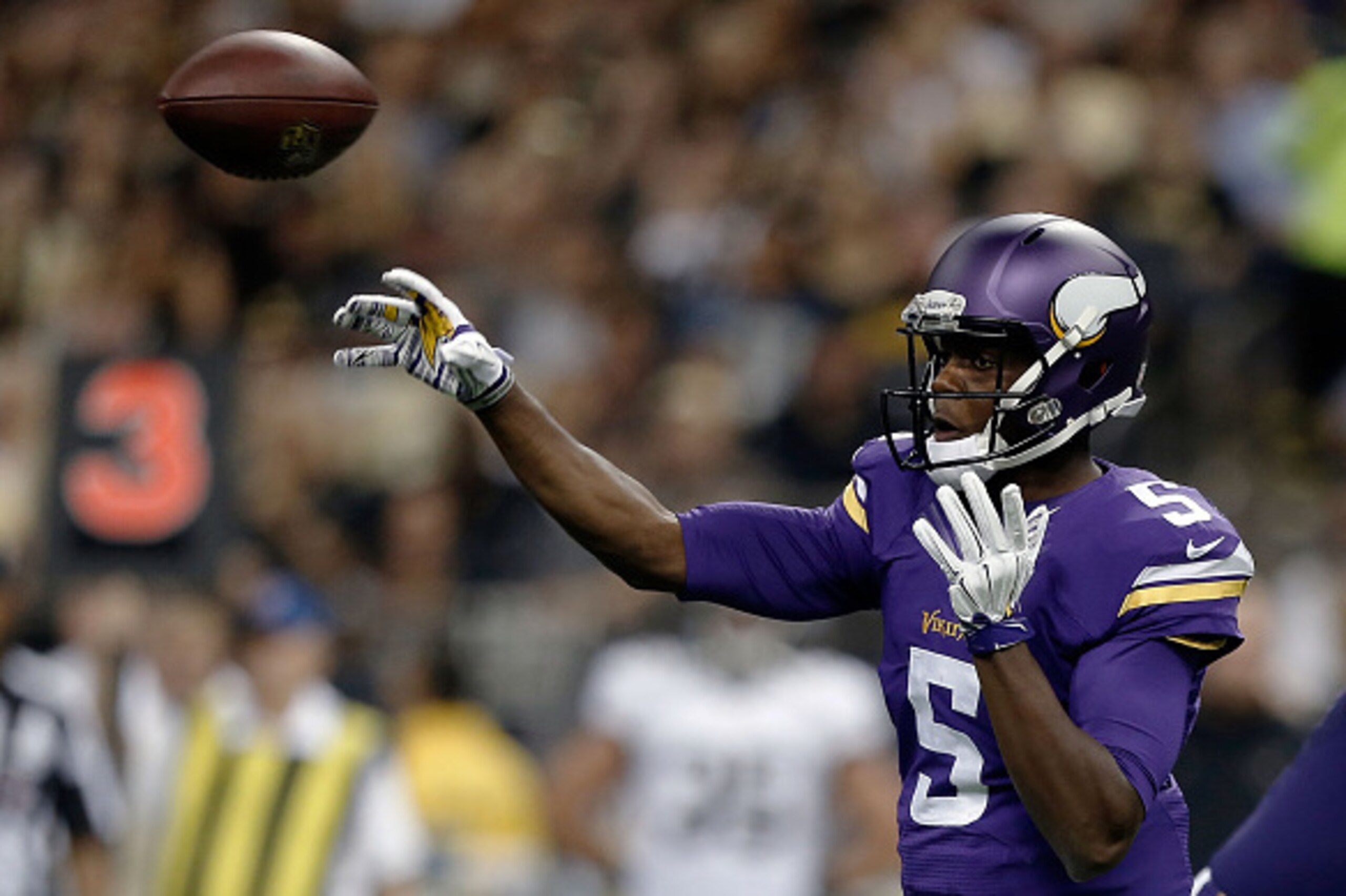 NEW ORLEANS, LA - SEPTEMBER 21:  Teddy Bridgewater #5 of the Minnesota Vikings throws a pass against the New Orleans Saints during the second quarter of a game at the Mercedes-Benz Superdome on September 21, 2014 in New Orleans, Louisiana.  (Photo by Sean