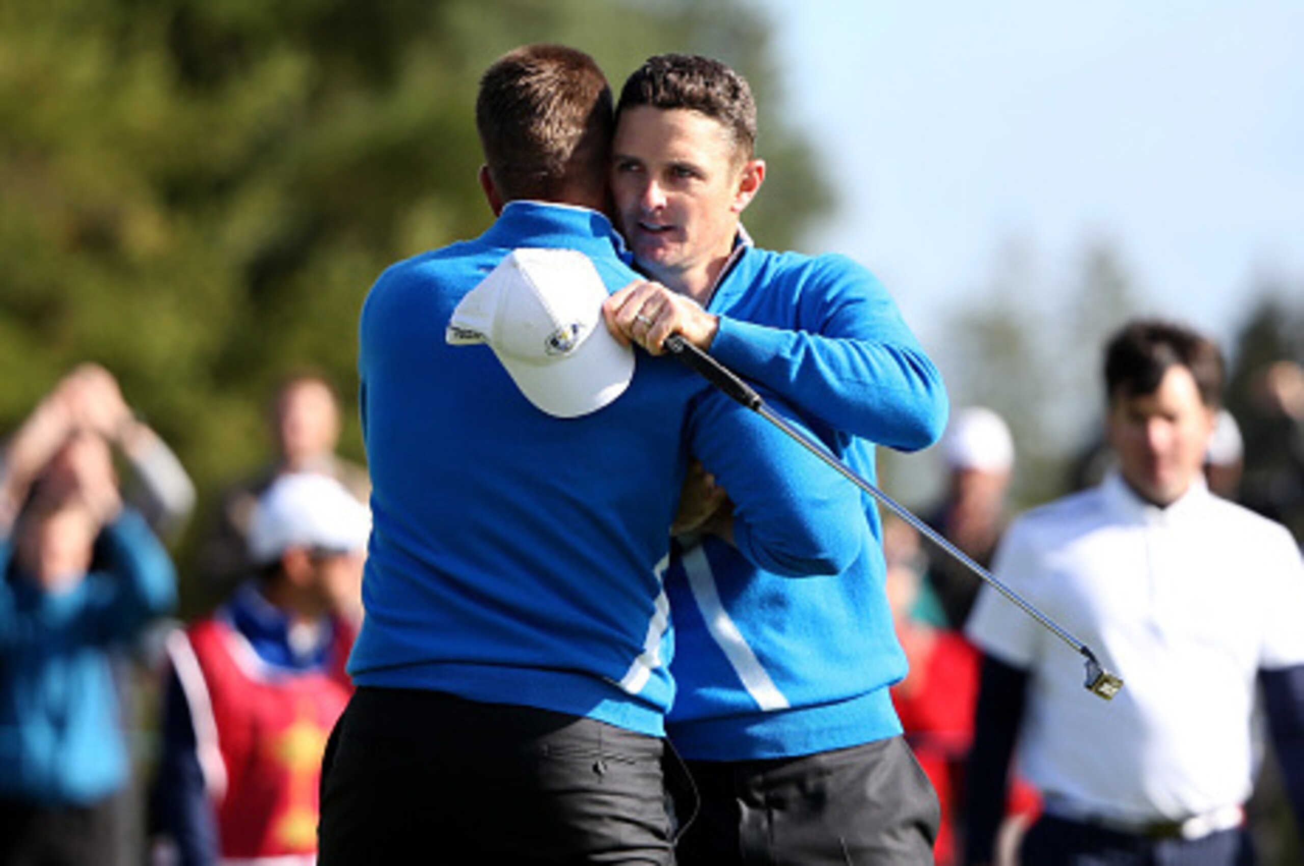 AUCHTERARDER, SCOTLAND - SEPTEMBER 26:  Justin Rose (R) of Europe celebrates winning the first point for Europe on the 14th green with Henrik Stenson during the Morning Fourballs of the 2014 Ryder Cup on the PGA Centenary course at the Gleneagles Hotel on
