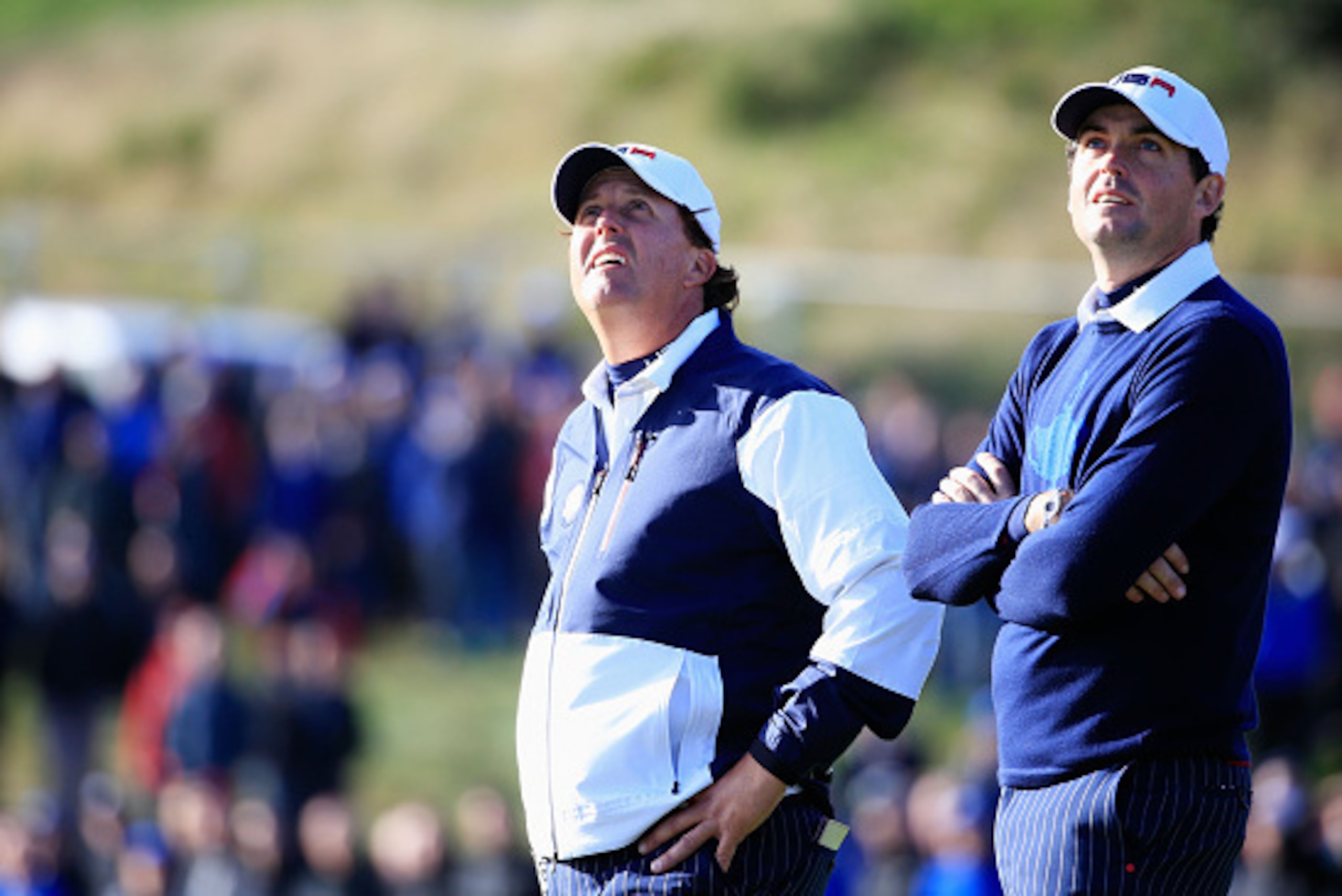 AUCHTERARDER, SCOTLAND - SEPTEMBER 26: Phil Mickelson (L) and Keegan Bradley of the United States watch on the 7th hole during the Afternoon Foursomes of the 2014 Ryder Cup on the PGA Centenary course at the Gleneagles Hotel on September 26, 2014 in Aucht