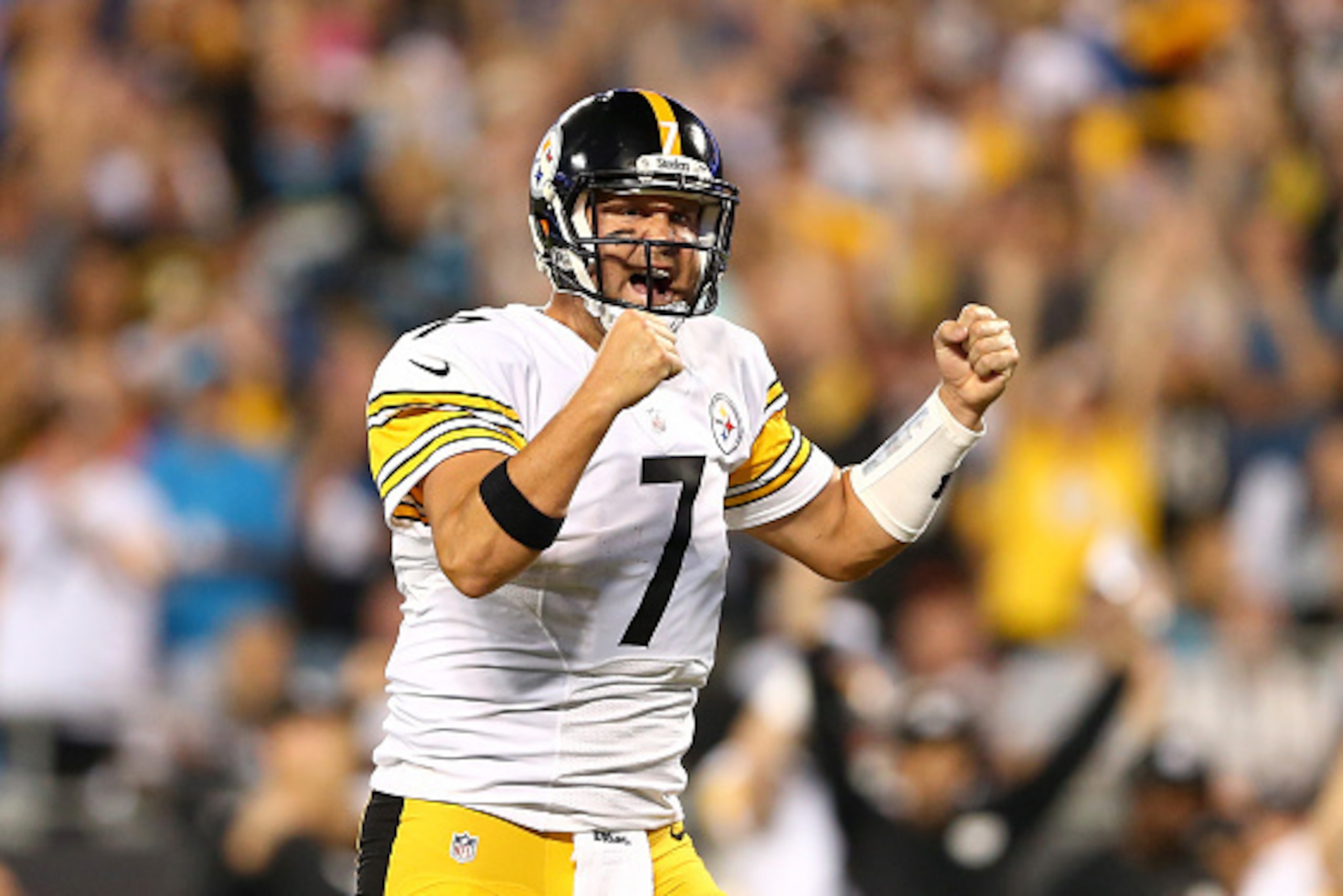 CHARLOTTE, NC - SEPTEMBER 21:   Ben Roethlisberger #7 of the Pittsburgh Steelers reacts after a touchdown in the first half during the game against the Carolina Panthers at Bank of America Stadium on September 21, 2014 in Charlotte, North Carolina. The to