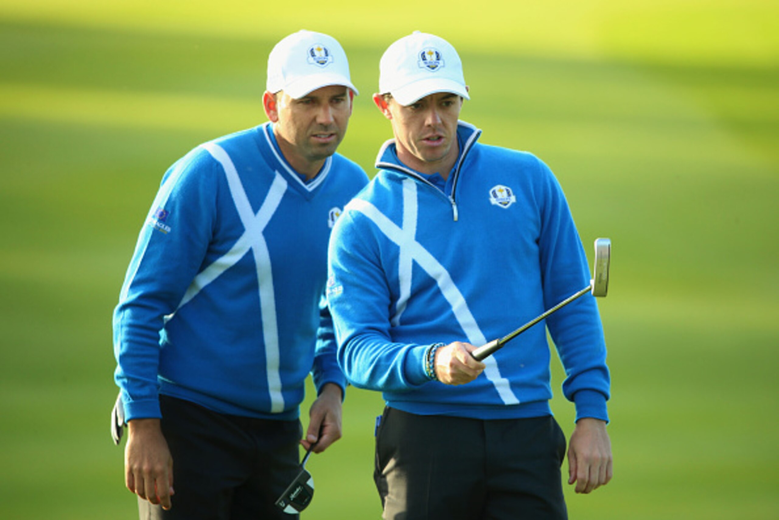 AUCHTERARDER, SCOTLAND - SEPTEMBER 26:  Rory McIlroy of Europe and Sergio Garcia of Europe in discussion on the 15th green during the Afternoon Foursomes of the 2014 Ryder Cup on the PGA Centenary course at the Gleneagles Hotel on September 26, 2014 in Au