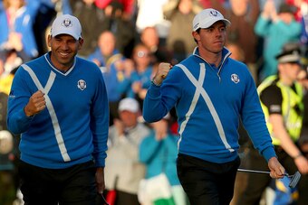 AUCHTERARDER, SCOTLAND - SEPTEMBER 26:  Rory McIlroy (R) of Europe celebrates a putt with Sergio Garcia of Europe on the 17th green during the Afternoon Foursomes of the 2014 Ryder Cup on the PGA Centenary course at the Gleneagles Hotel on September 26, 2