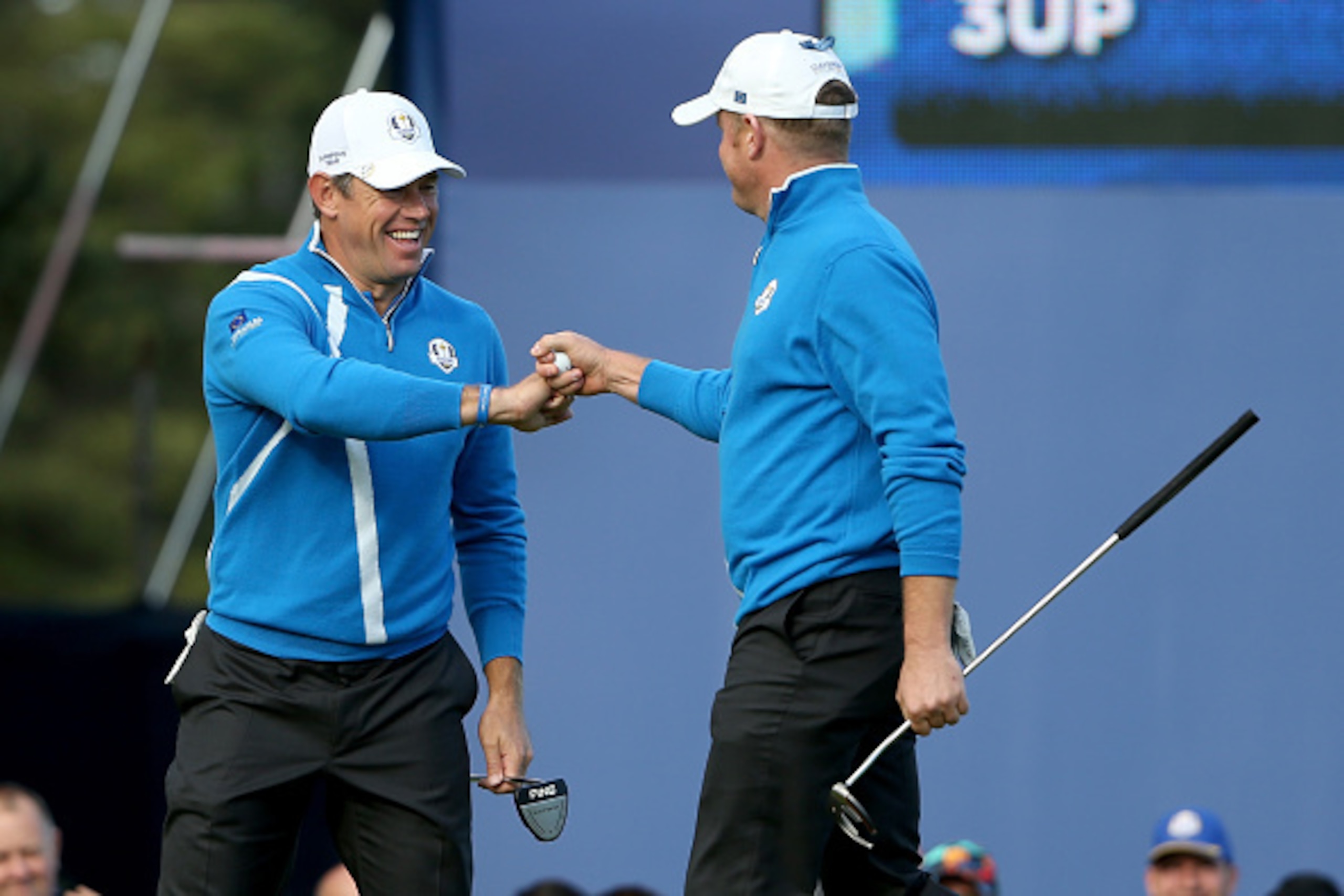 AUCHTERARDER, SCOTLAND - SEPTEMBER 26:  Lee Westwood (L) and Jamie Donaldson of Europe celebrate on the 13th green during the Afternoon Foursomes of the 2014 Ryder Cup on the PGA Centenary course at the Gleneagles Hotel on September 26, 2014 in Auchterard