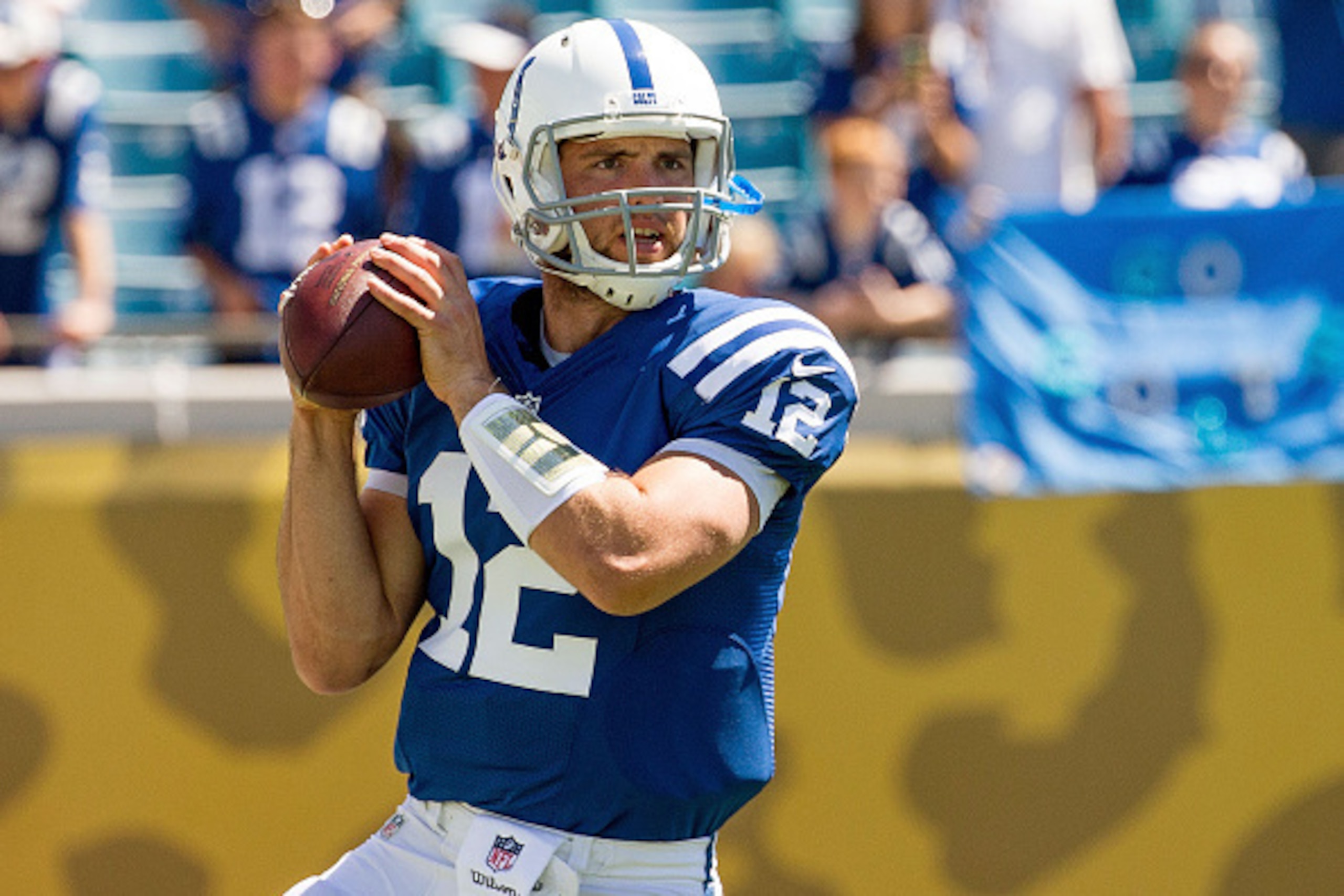 JACKSONVILLE, FL - SEPTEMBER 21: Andrew Luck #12 of the Indianapolis Colts warms up before the game against the Jacksonville Jaguars at EverBank Field on September 21, 2014 in Jacksonville, Florida.  (Photo by Rob Foldy/Getty Images)